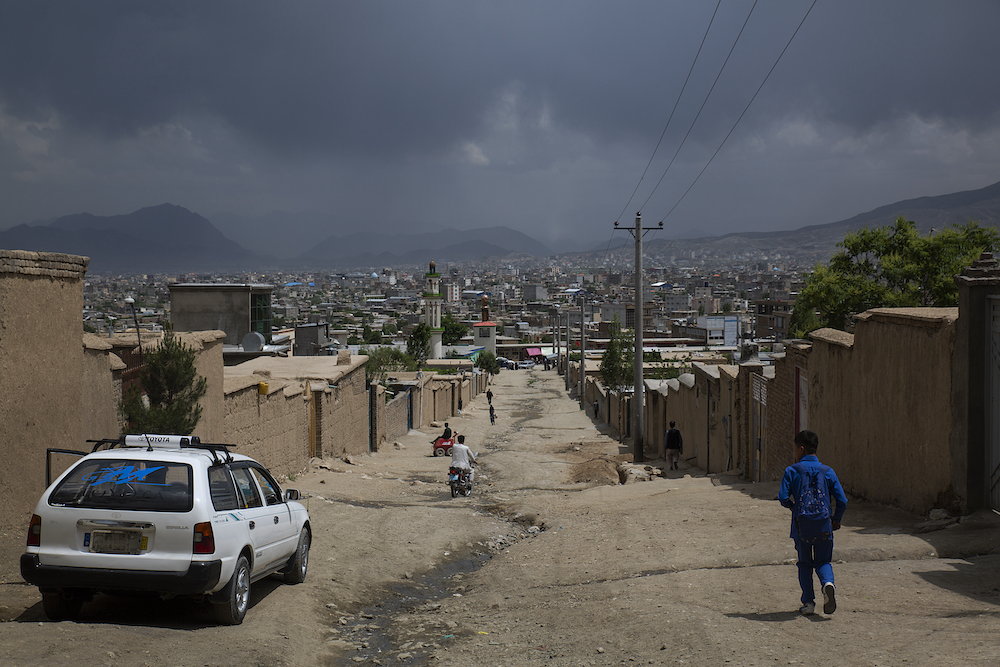 Despite the threats, the neighbourhood – with its mostly dirt roads that stretch out for kilometres – remains a vibrant, bustling home to hundreds of thousands of people