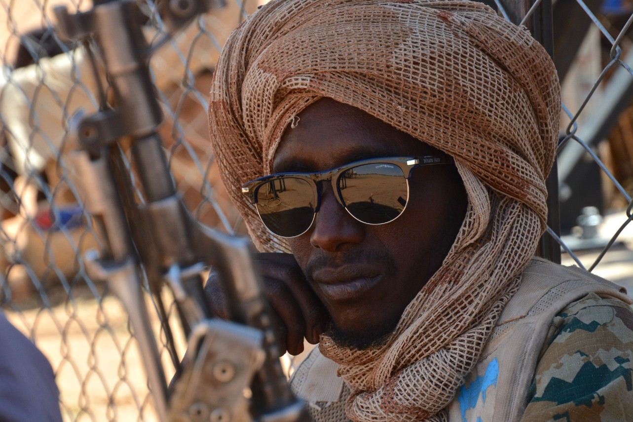 An RSF member guards a desert water station in North Darfur [Jérôme Tubiana/Al Jazeera]