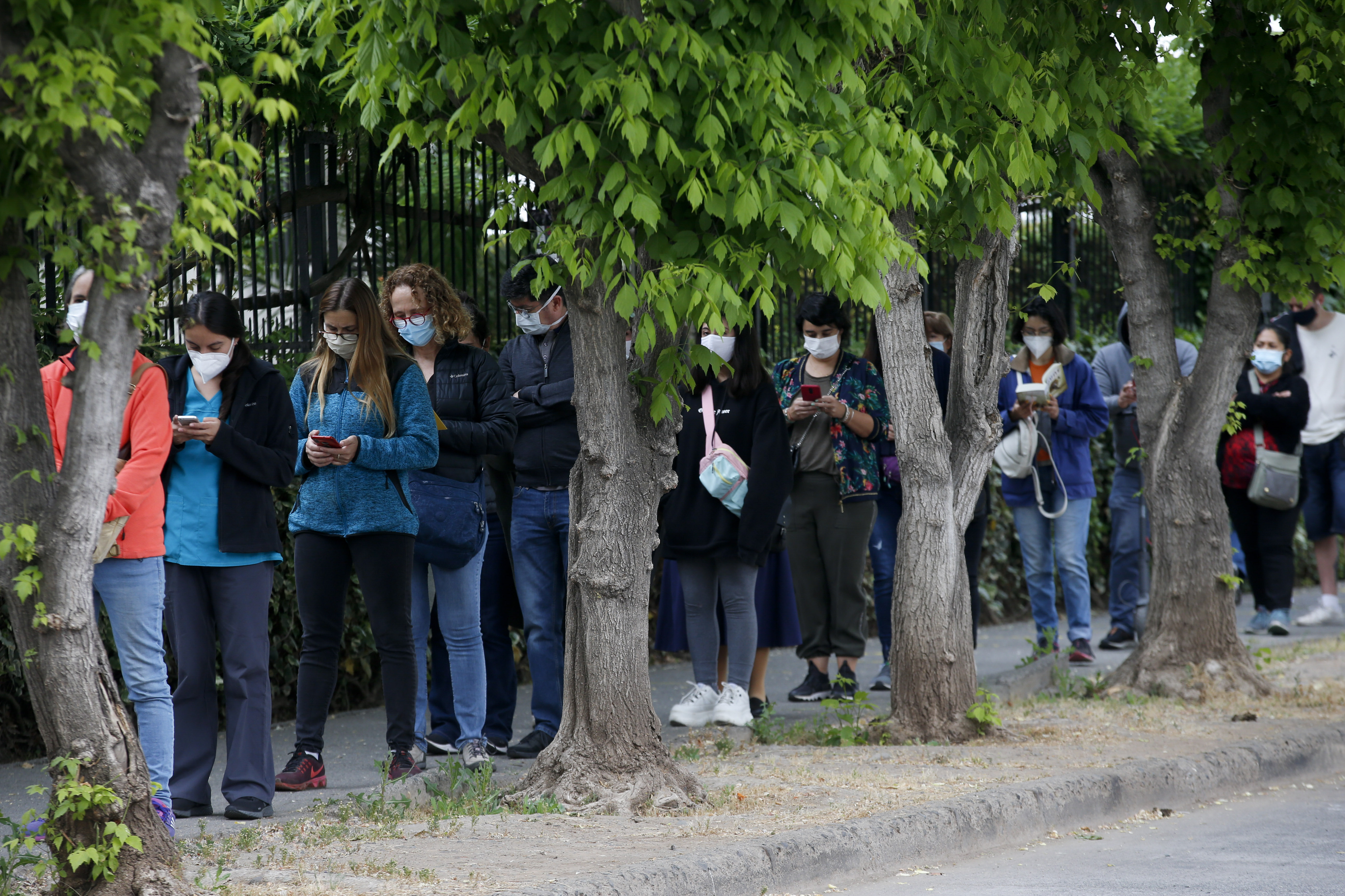 People lined up to vote in Santiago, Chile on October 25, 2020, on whether to draft a new constitution to replace guiding principles imposed four decades ago under a military dictatorship. The initiative succeeded, and representatives are now in the process of drafting the new document
