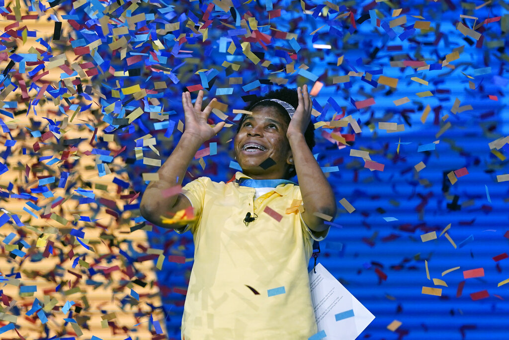Zaila Avant-garde, 14, from Harvey, Louisiana is covered with confetti as she celebrates winning the finals of the 2021 Scripps National Spelling Bee at Disney World on July 8