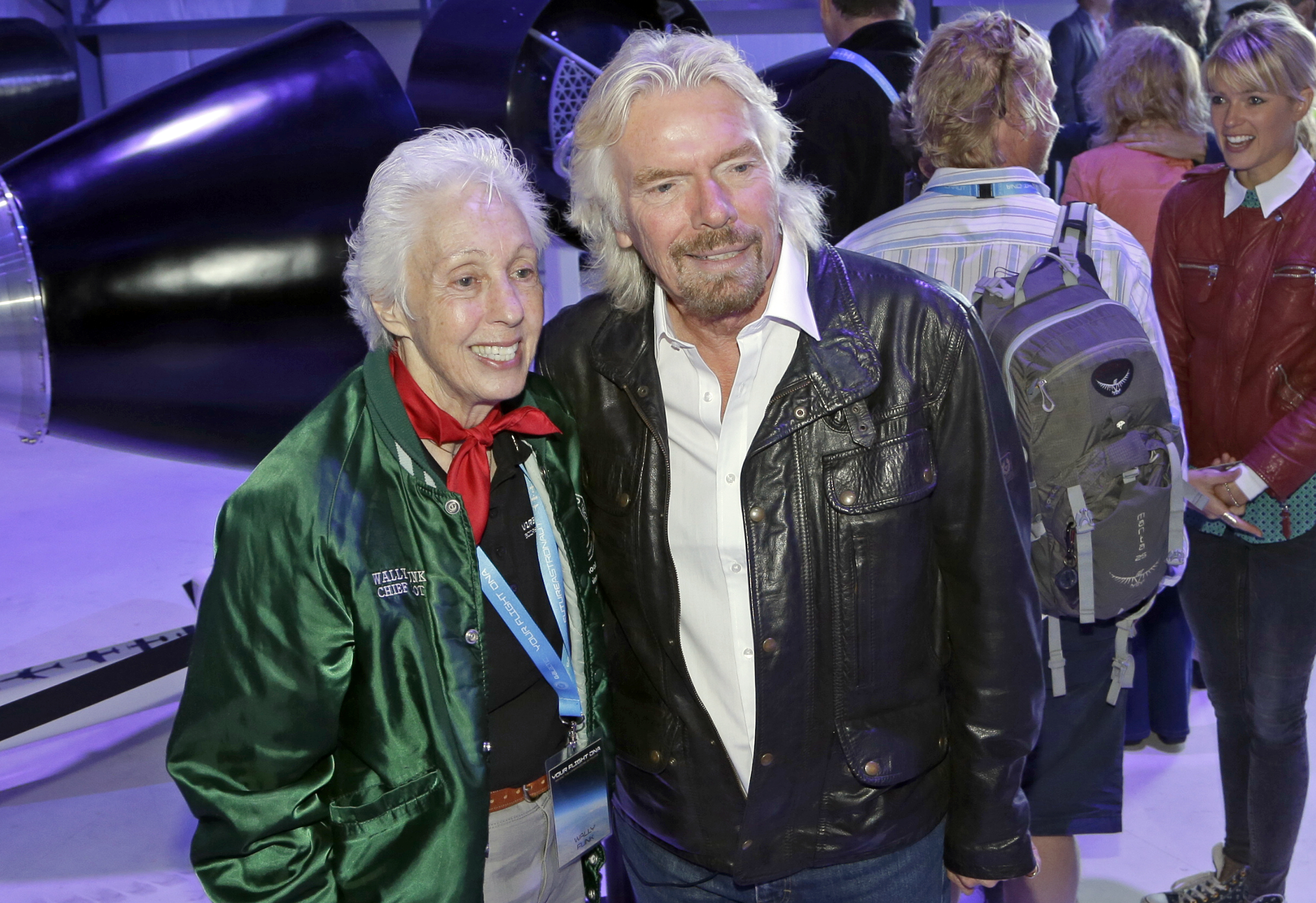 Virgin Galactic founder Richard Branson poses with Wally Funk at a 2012 gathering at the commercial space firm’s hangar at Mojave Air and Space Port in Mojave, California in the United States
