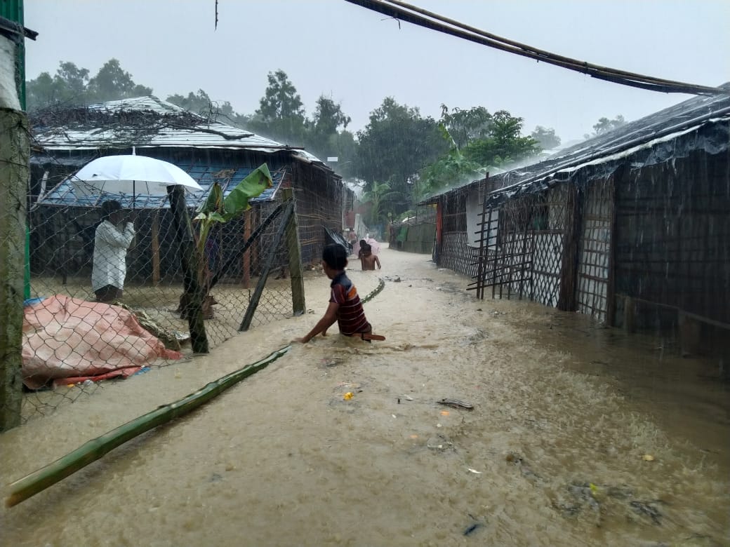 Rohingya refugees mostly live in shacks made of bamboo and plastic sheets that cling to steep, bare hills, and flooding has further worsened their living conditions