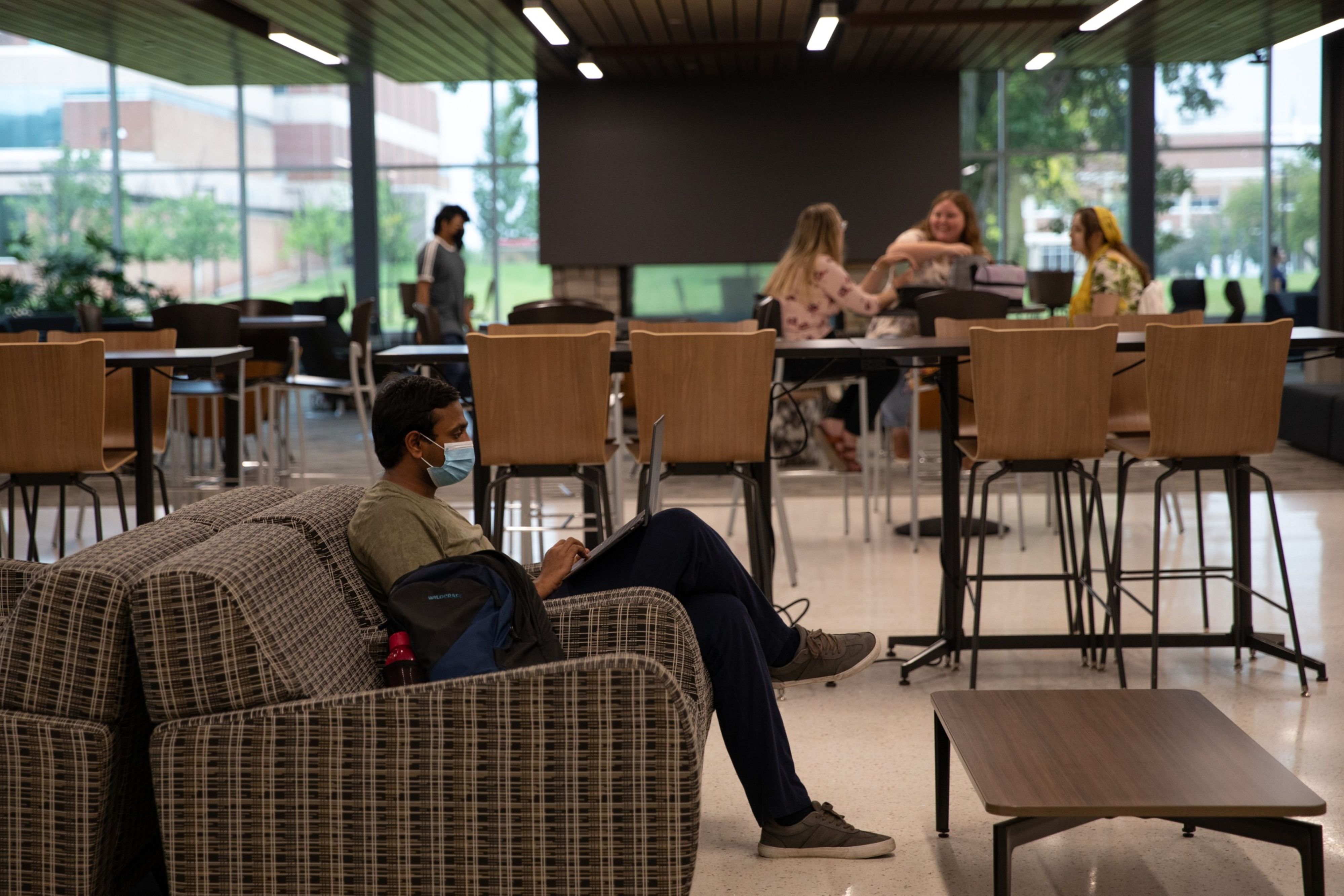 With students living and learning in close quarters, many colleges and universities have imposed vaccine mandates while encouraging mask-wearing indoors