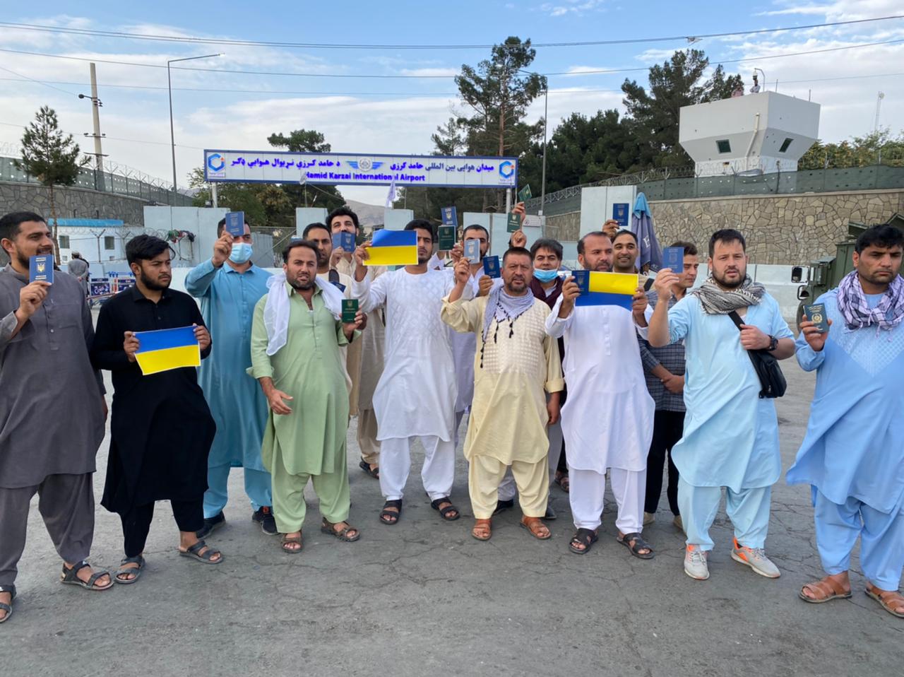 Ukrainians gathered near Hamid Karzai International airport in early September asking the Ukrainian president to evacuate them [Al Jazeera]
