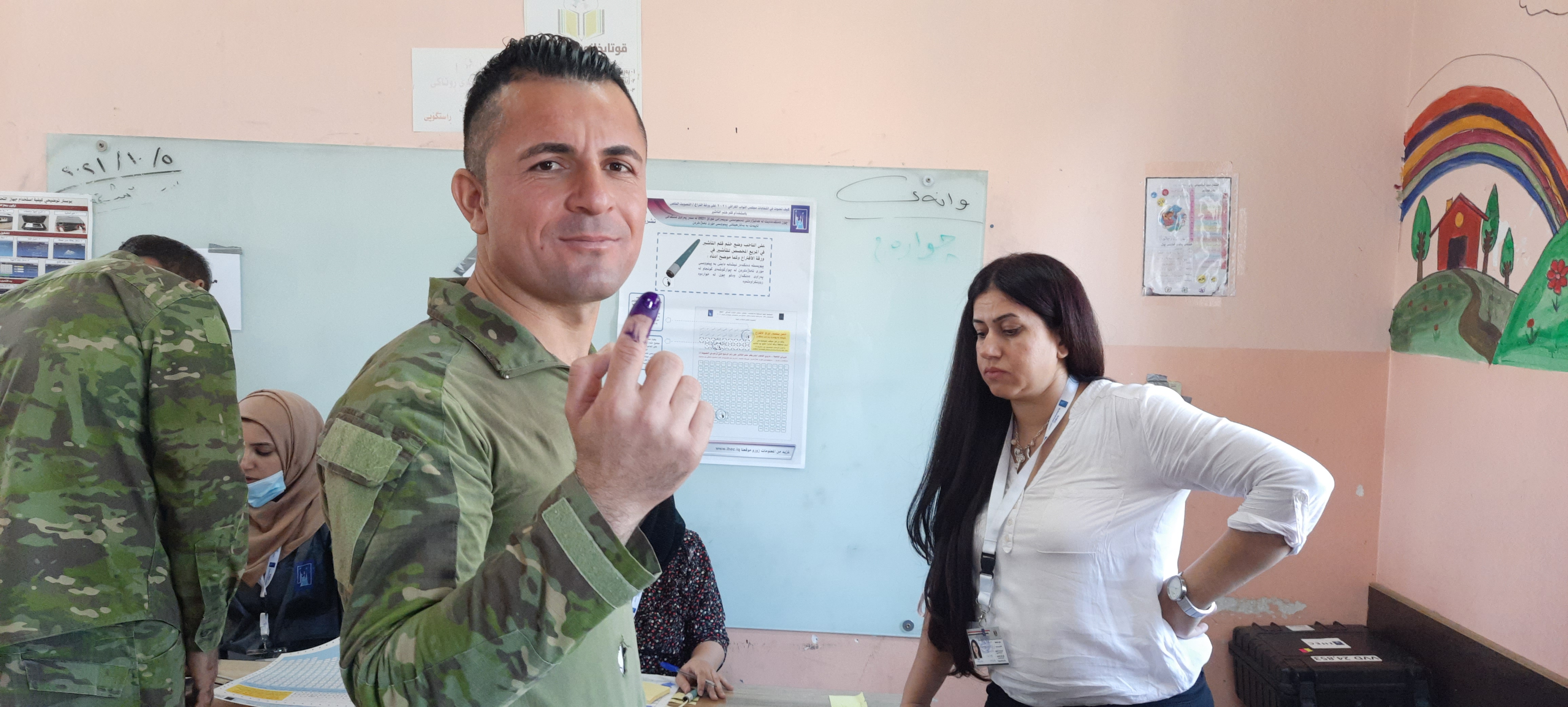 A Kurdish Peshmerga fighter after casting his vote in Sulaymaniyah