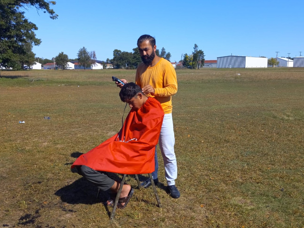 Mohammad says he hopes to open a barber shop once fully resettled in the US [Zubair Babakarkhail/Al Jazeera]