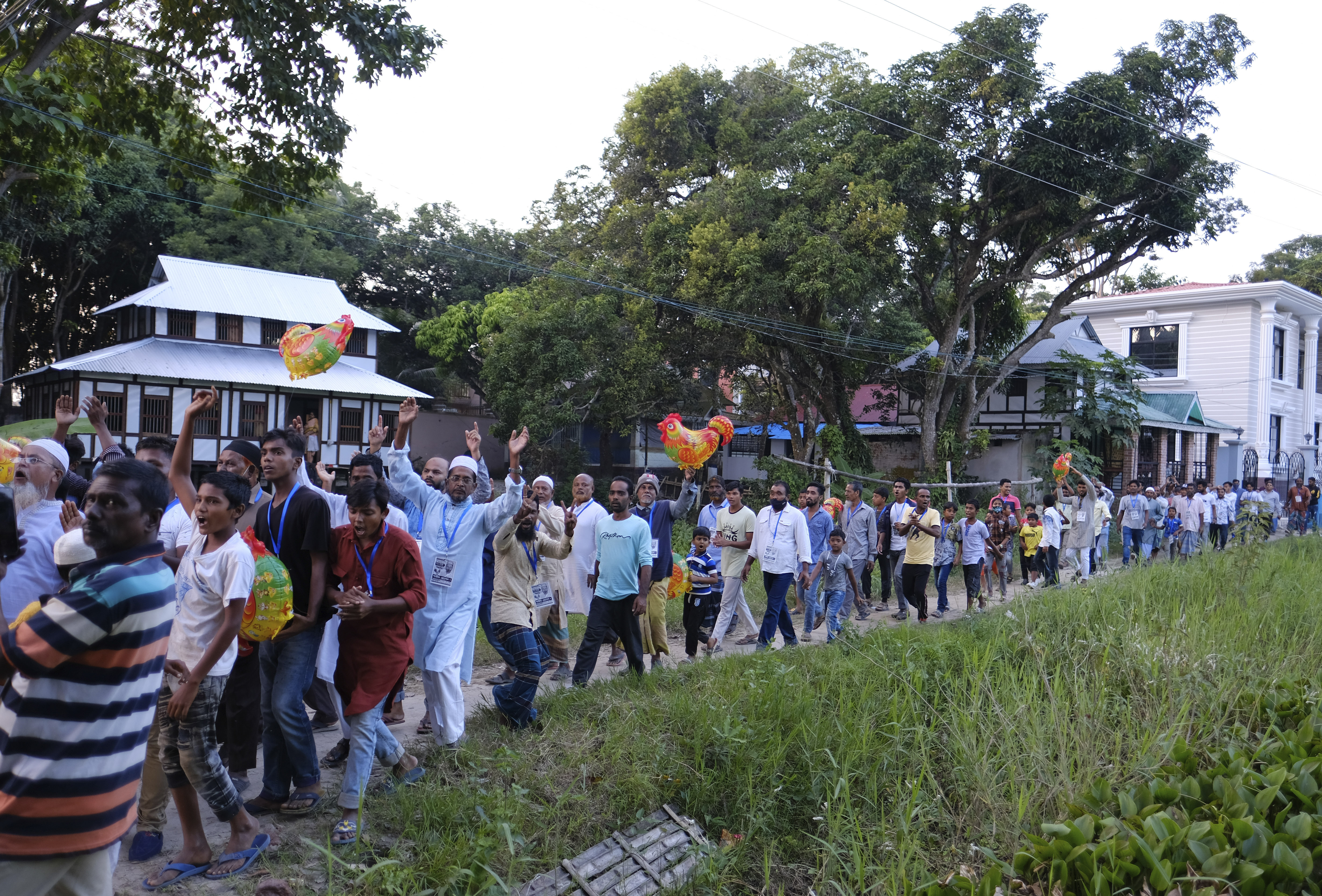 Supporters of an independent candidate campaign during an election rally in Sreenagar, Munshiganj district, Bangladesh
