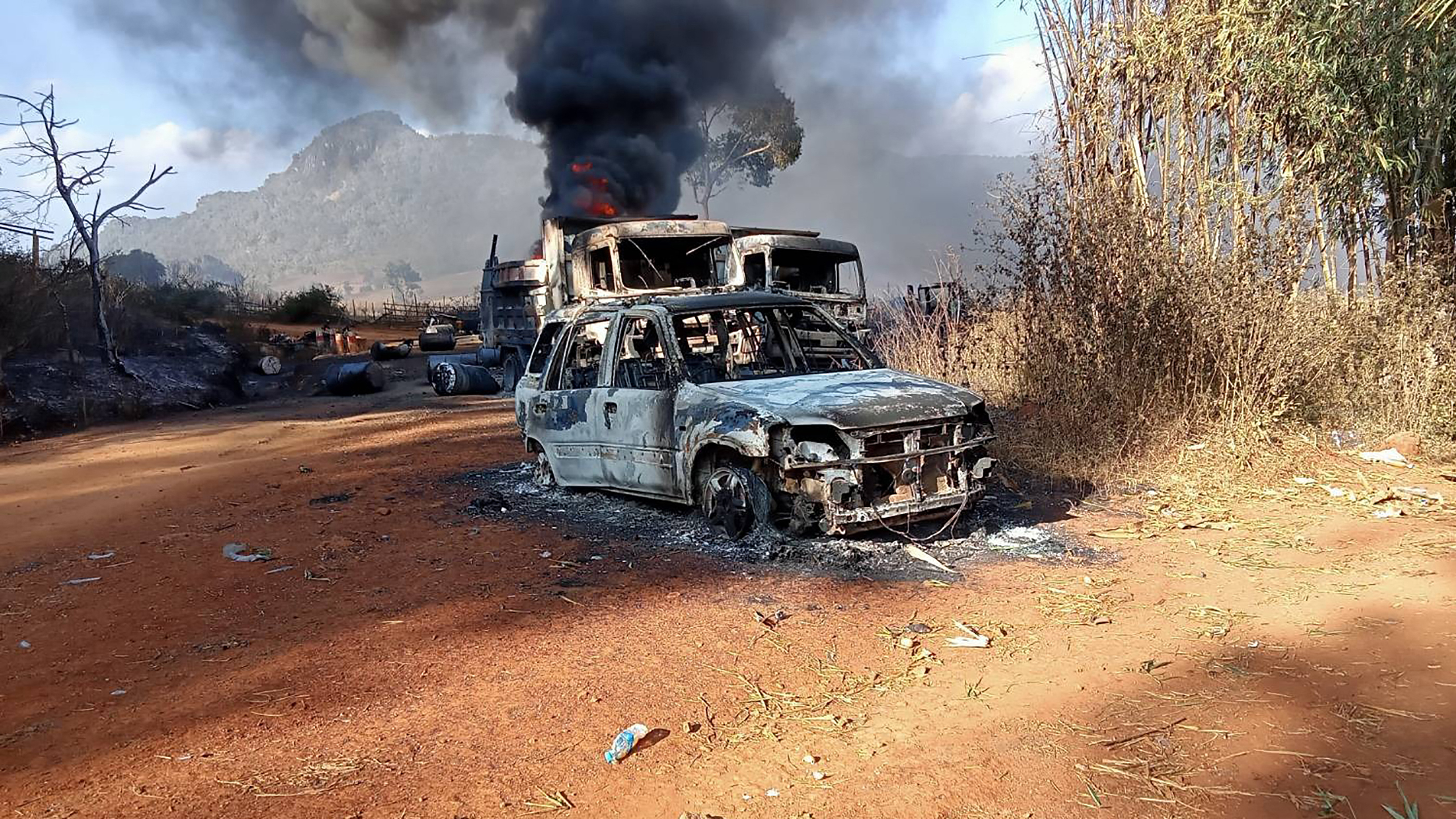 Burnt and destroyed vehicles are seen in Hpruso township in Kayah state, Myanmar
