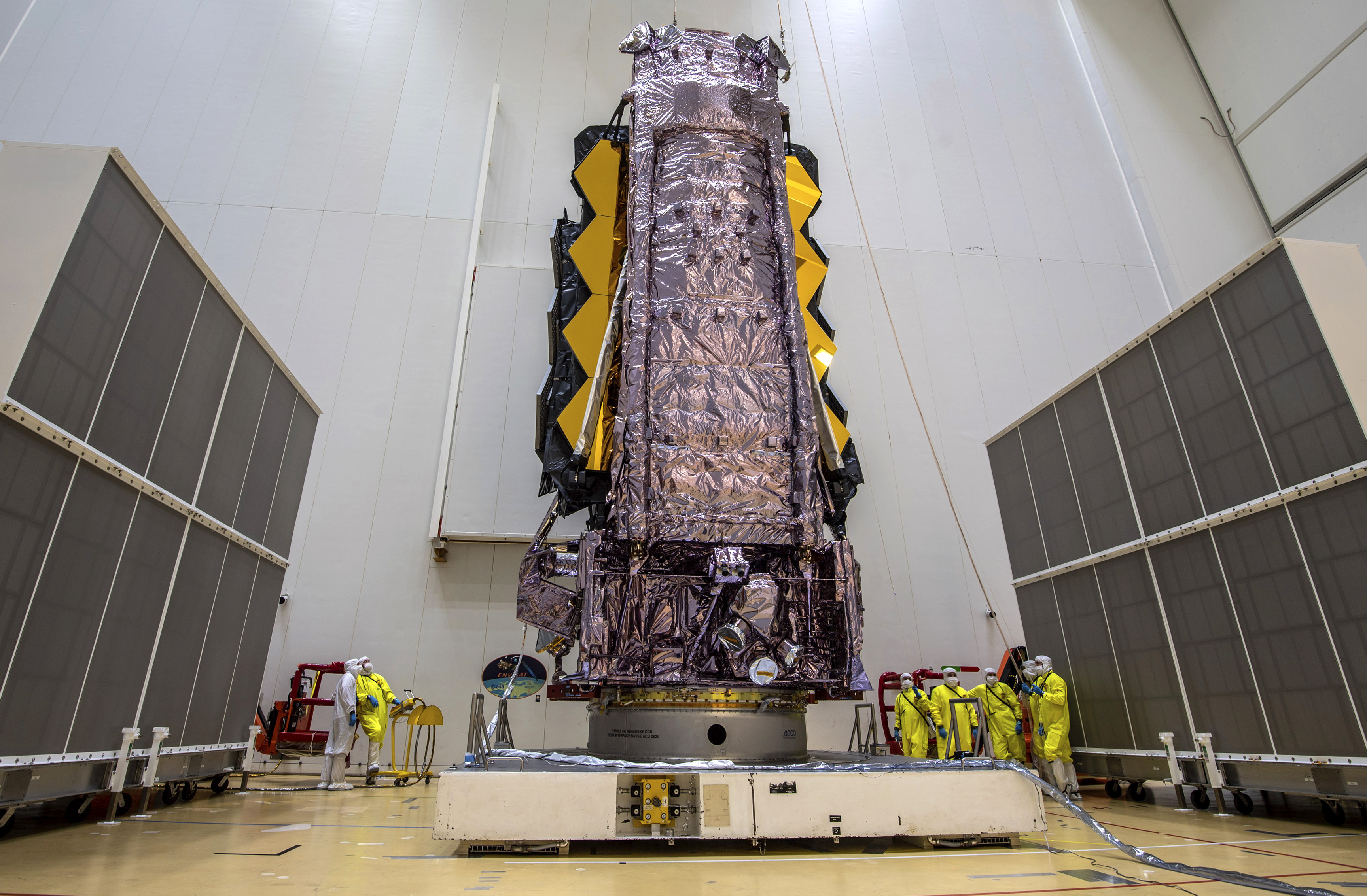 NASA's James Webb Space Telescope is secured on top of the Ariane 5 rocket that will launch it to space from Europe's Spaceport in French Guiana [File: M.Pedoussaut/ESA via AP]