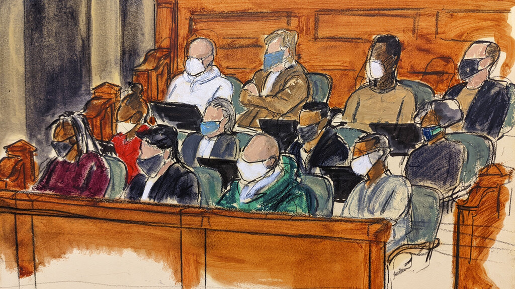 The main jury panel sits in the jury box waiting to be dismissed after deliberating during Ghislaine Maxwell's sex trafficking trial.