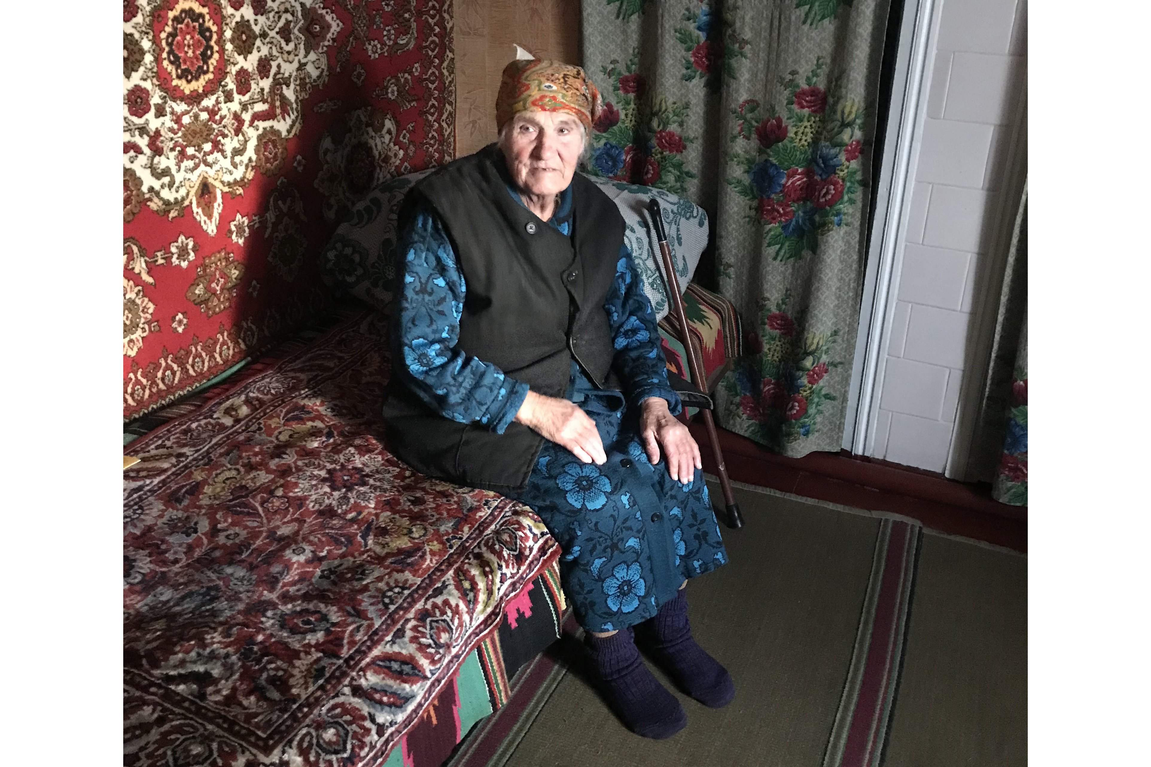 'Babushka' Olga in her house in Marinka