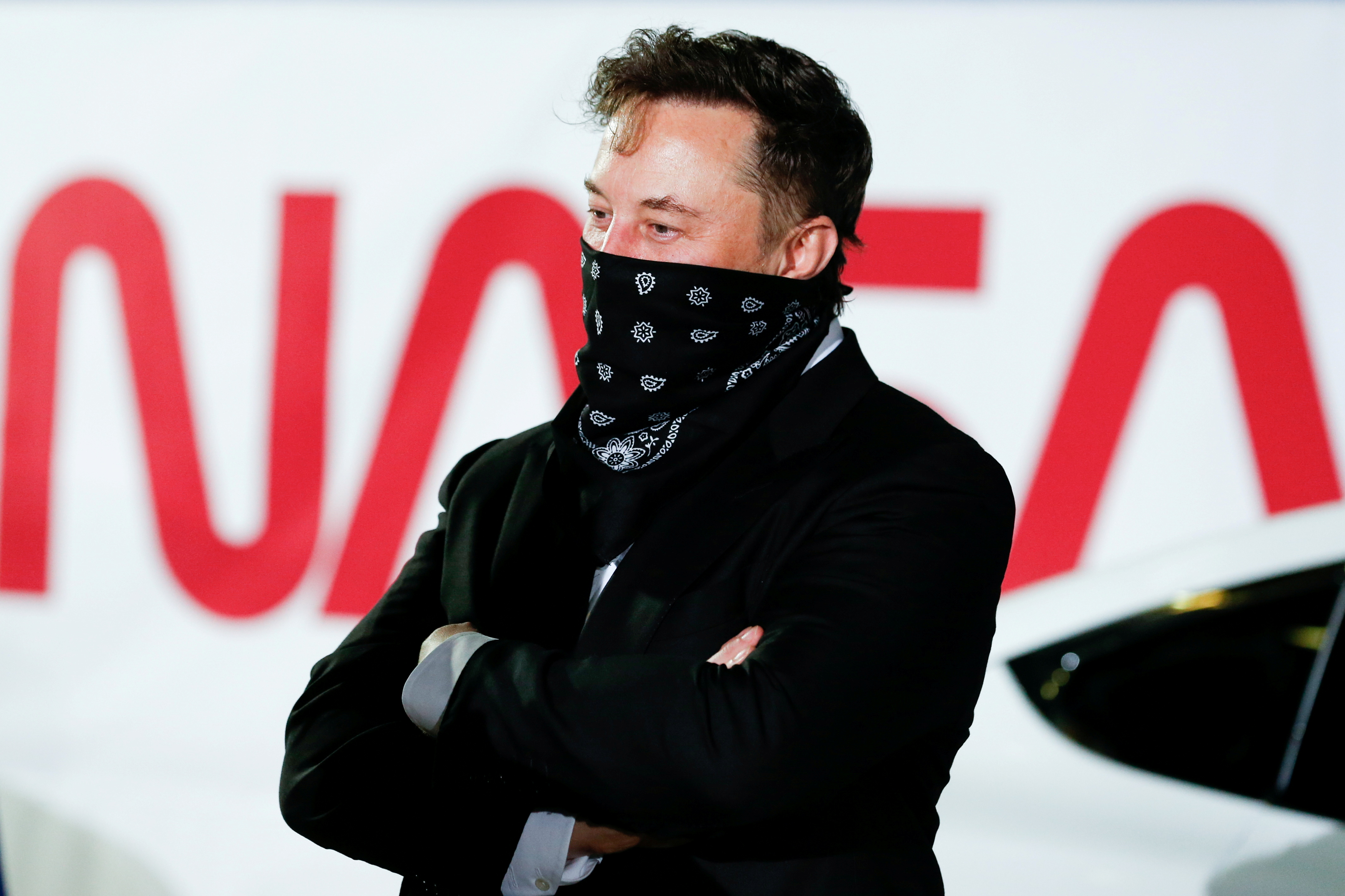Musk arrives ahead of the launch of the SpaceX Falcon 9 rocket with the Crew Dragon capsule, before the launch of their NASA commercial crew mission at Kennedy Space Center in Cape Canaveral, Florida, the United States