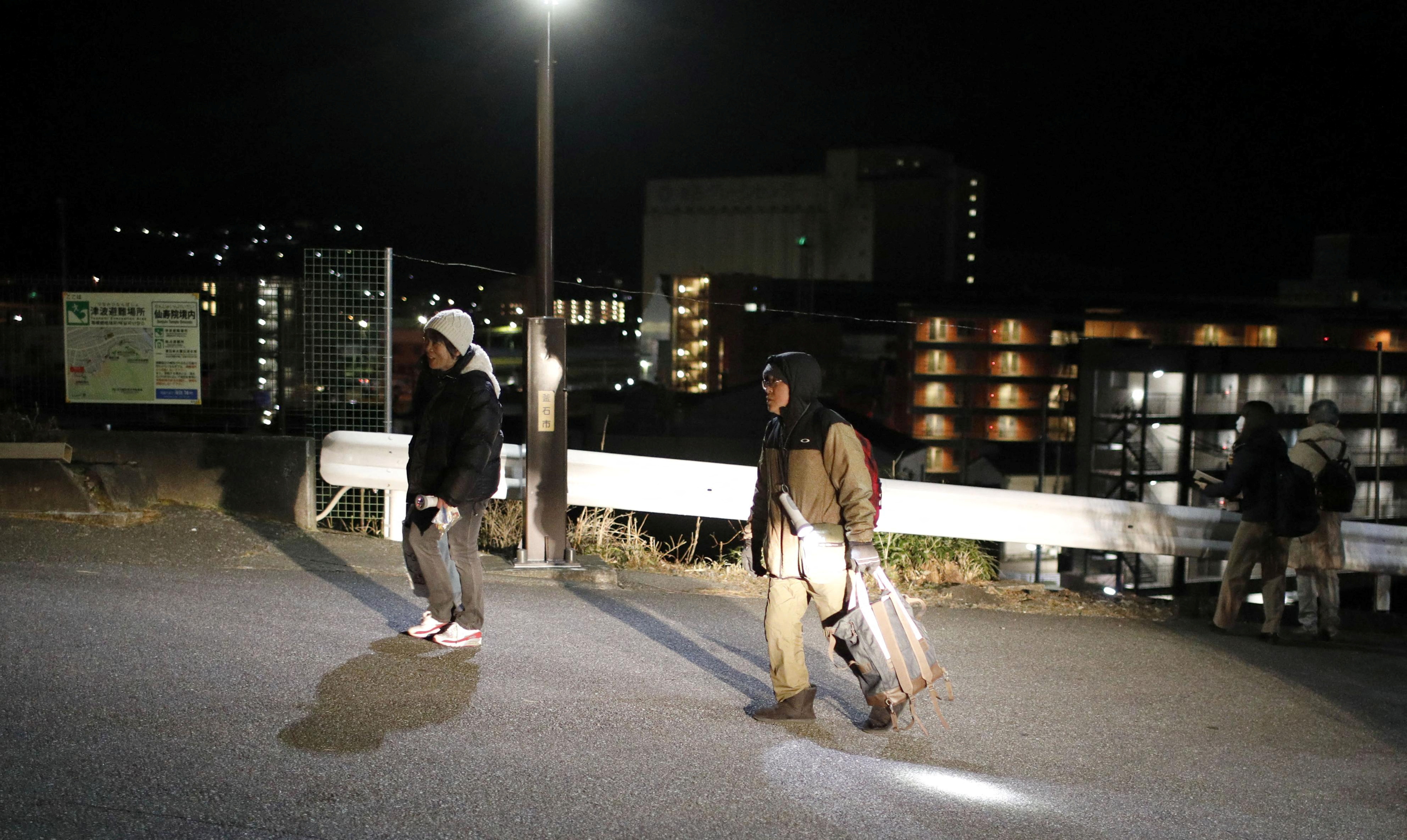 Local resident evacuees after an tsunami warning was issued for coastal towns in northeastern Japan