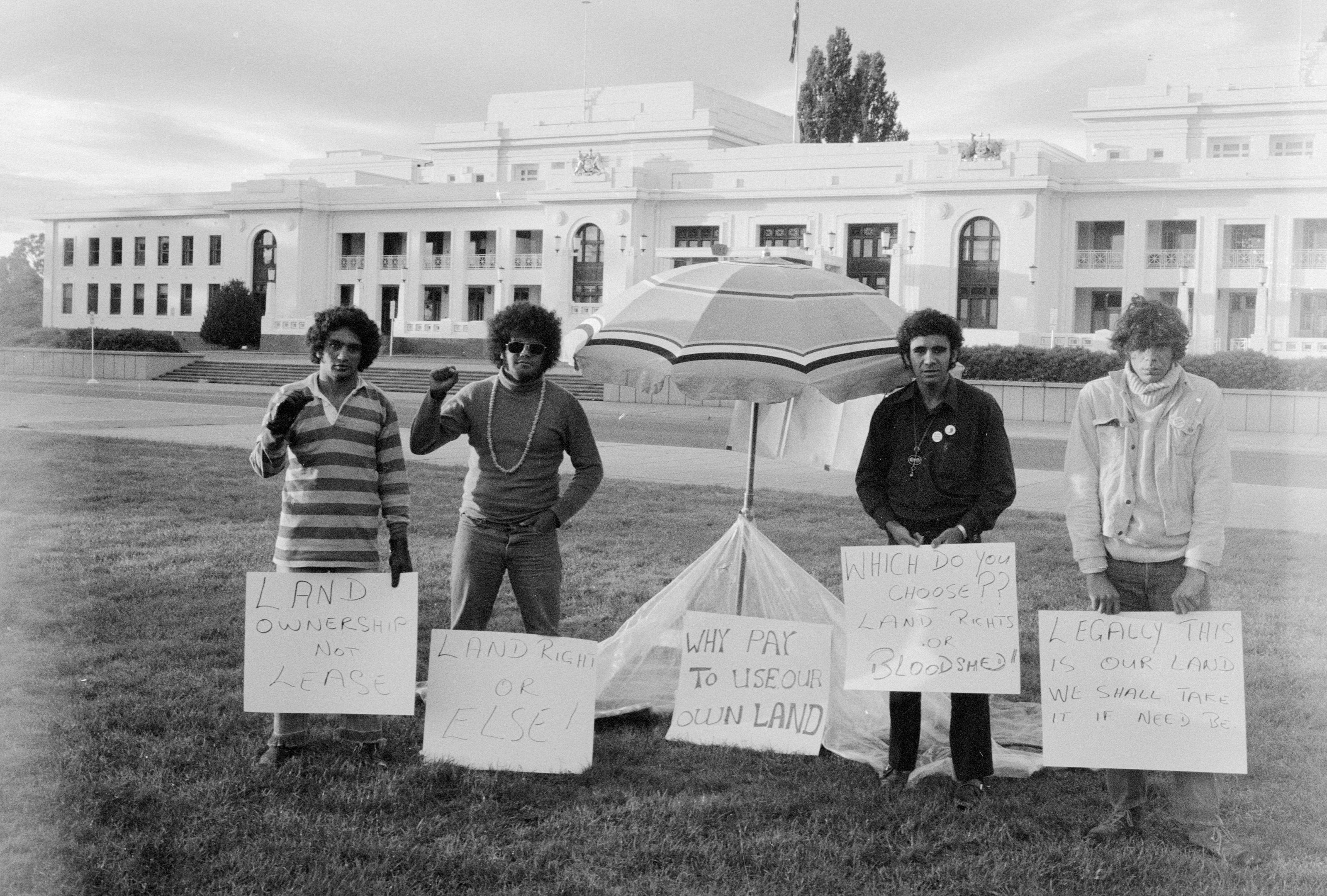 Activists Billy Craigie, Bert Williams, Michael Anderson and Tony Coorey stand outside Parliament House, Canberra on January 27, 1972