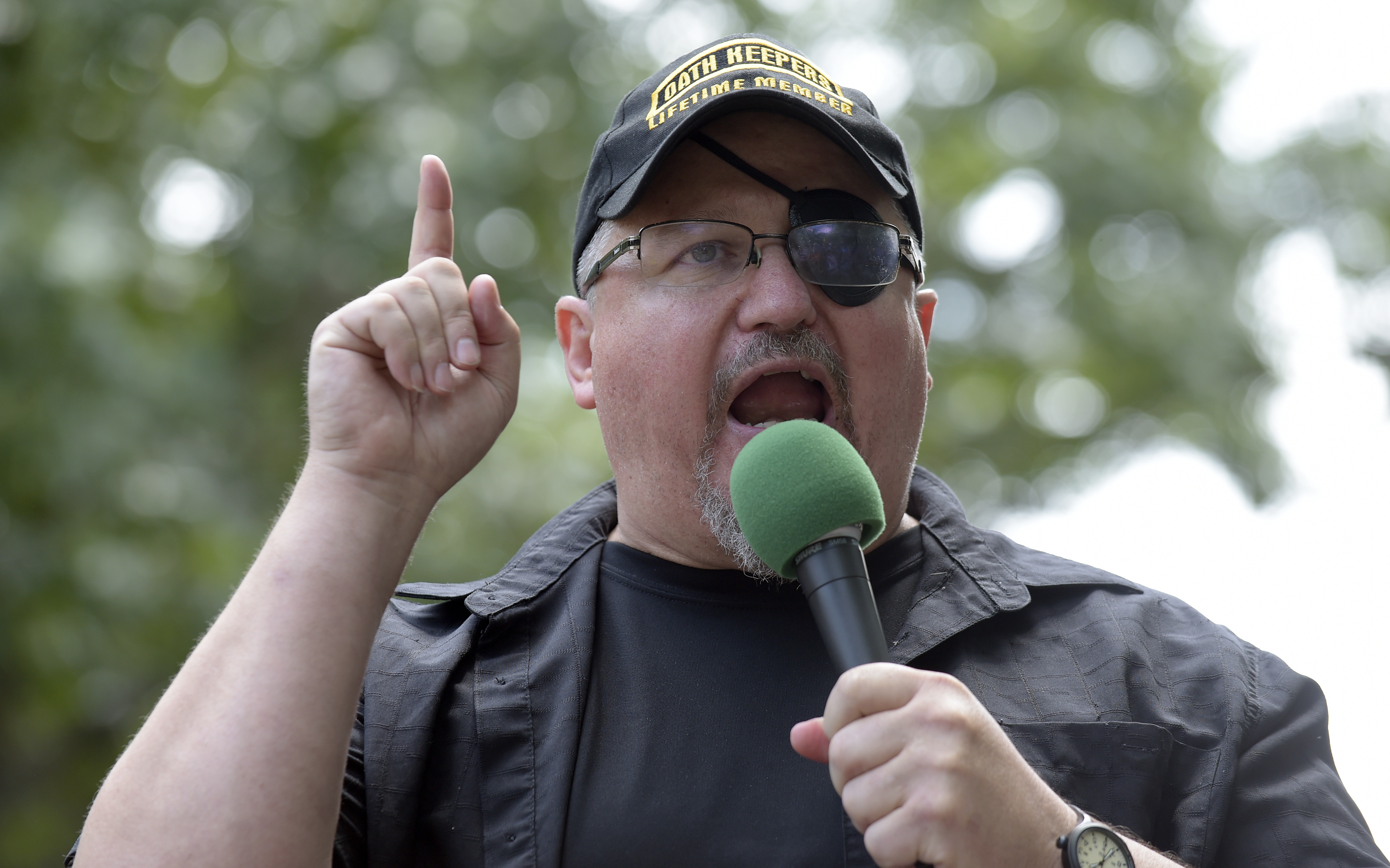 Oath Keepers founder Stewart Rhodes speaks at a rally