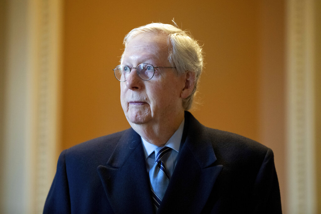 Senate Minority Leader Mitch McConnell of Kentucky speaks to a reporter at the Capitol in Washington.