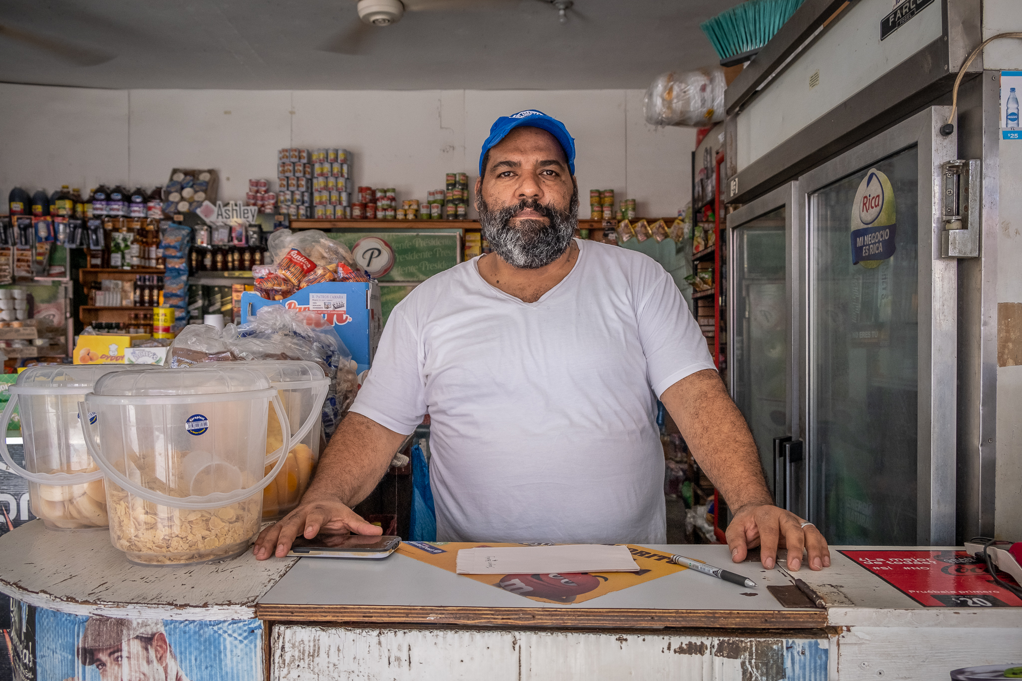 Hilario Fulgencio Azo at his colmado in Haina