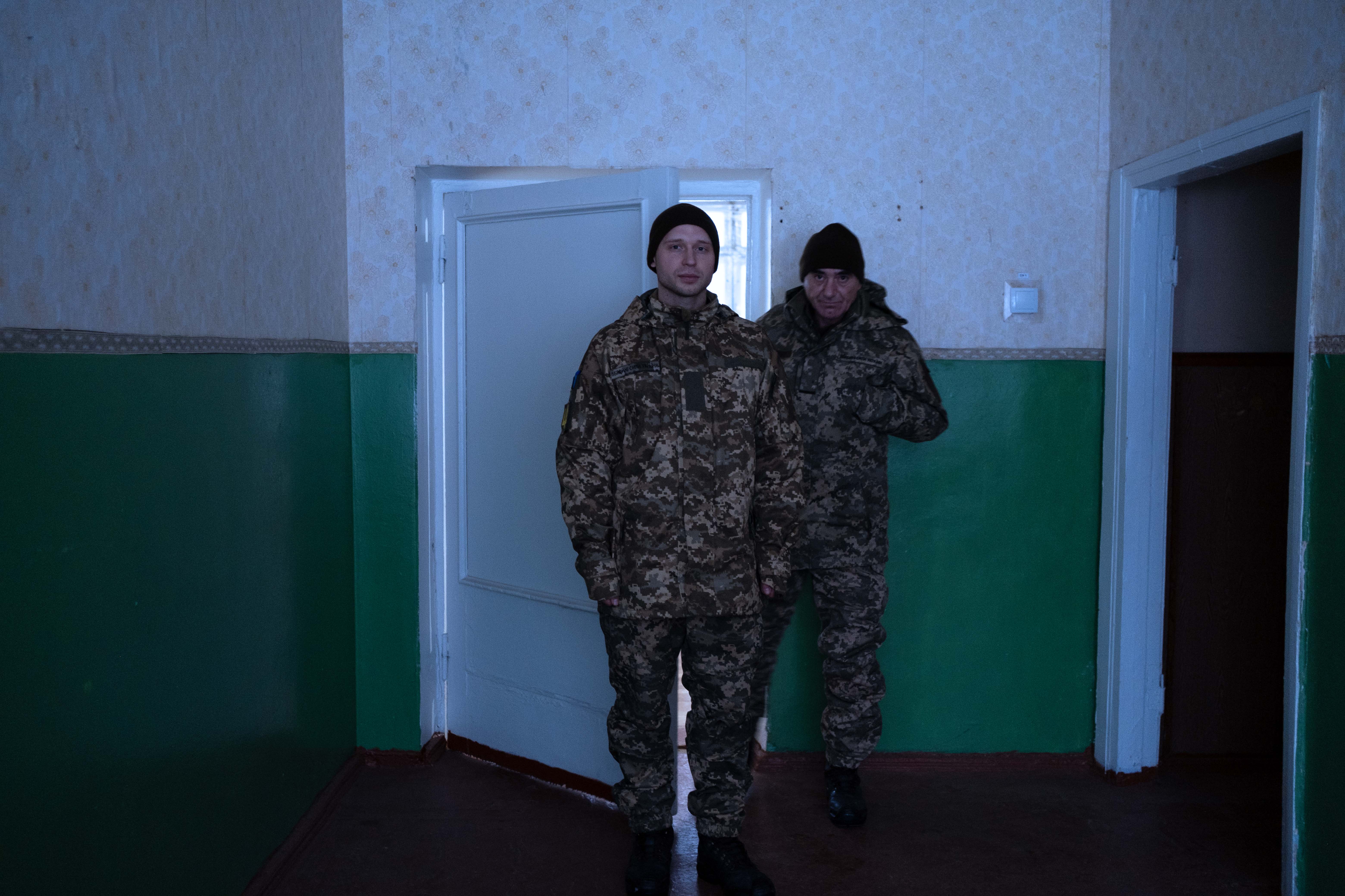 Roman (center) in Izyum, Kharkiv Oblast