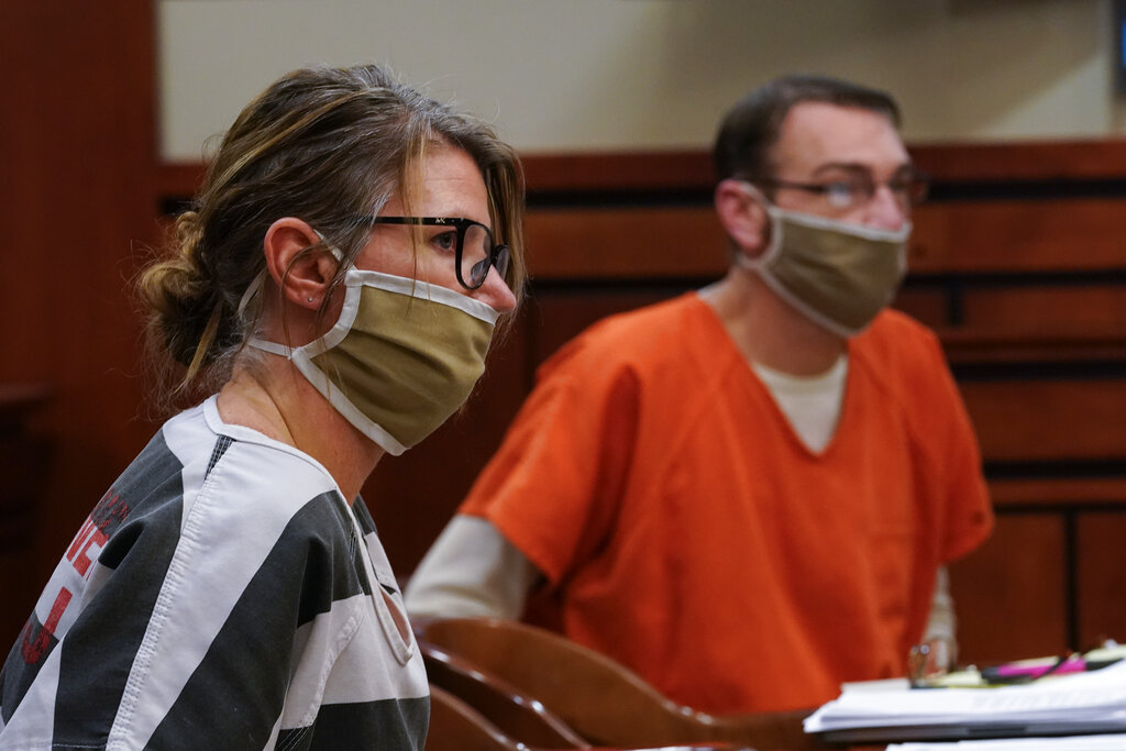 Jennifer and James Crumbley, the parents of Ethan Crumbley, a teenager accused of killing four students in a shooting at Oxford High School, appear in court for a preliminary examination on involuntary manslaughter charges in Rochester Hills, Michigan.