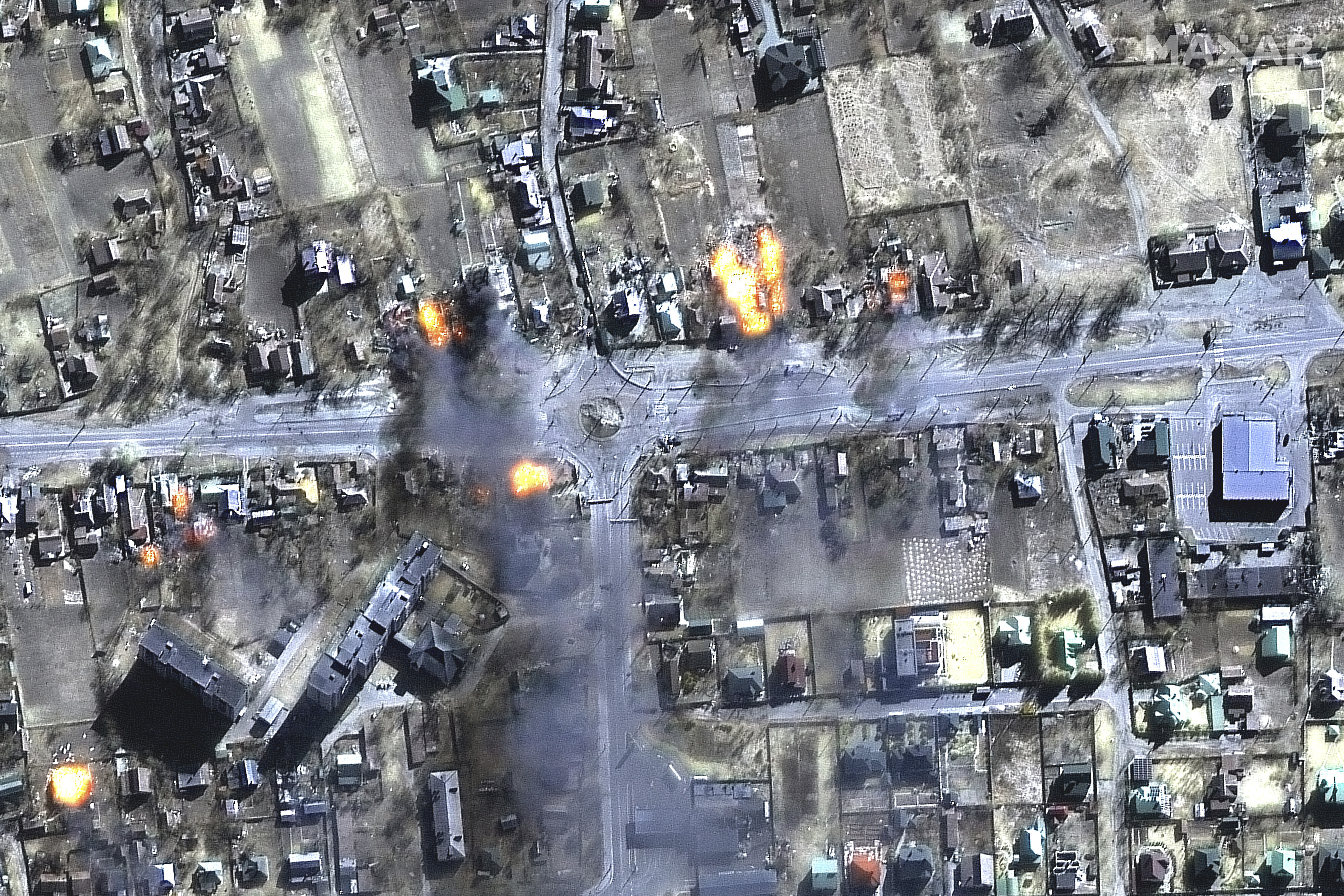 This satellite image provided by Maxar Technologies shows burning buildings in a residential area in northeast Chernihiv, Ukraine on Wednesday, March 16, 2022. (Maxar Technologies via AP)