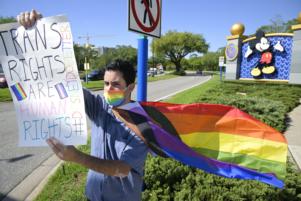 Disney cast member Nicholas Maldonado protests his company's stance on LGBTQ issues, while participating in an employee walkout at Walt Disney World.