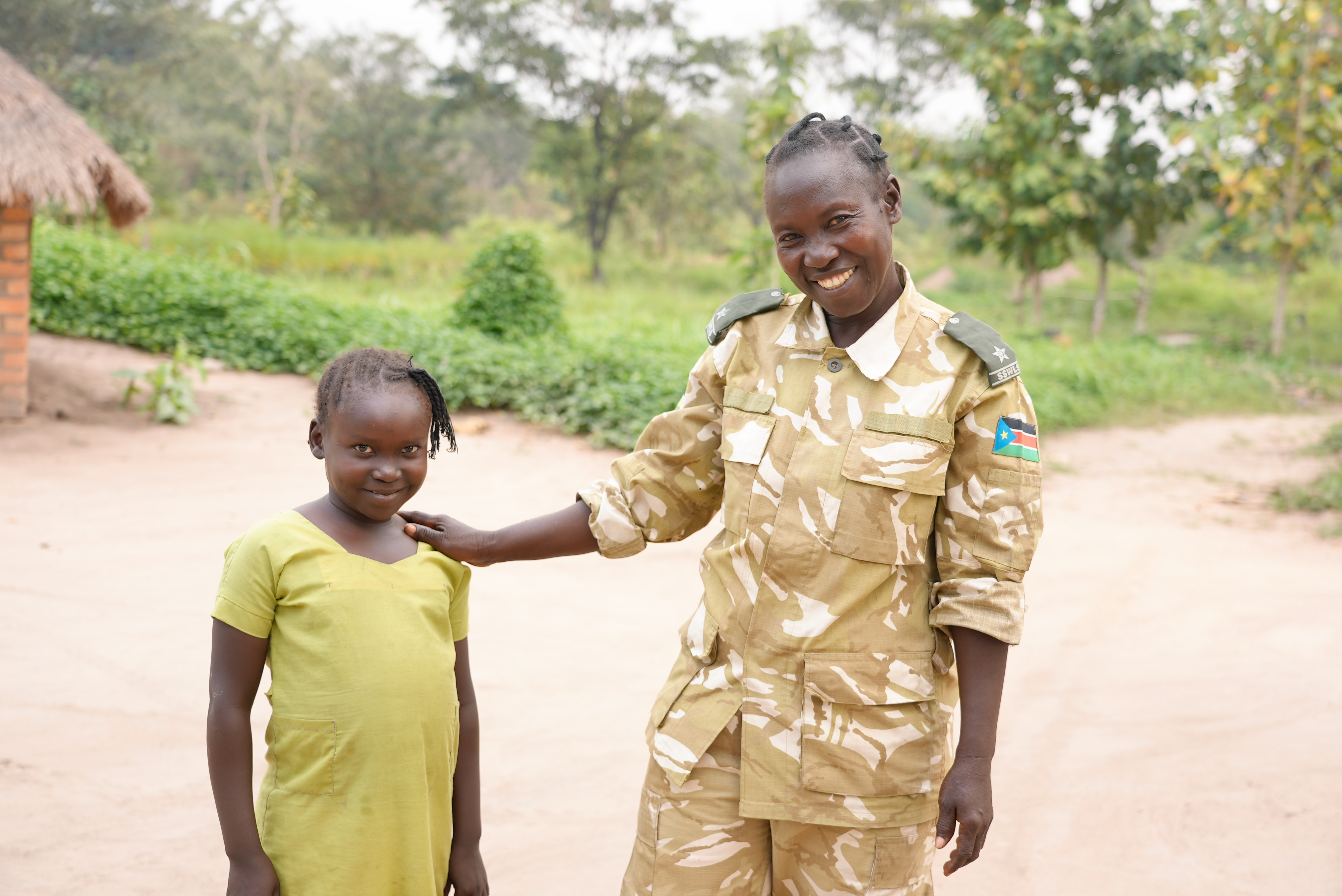 A woman forest ranger and her daughter