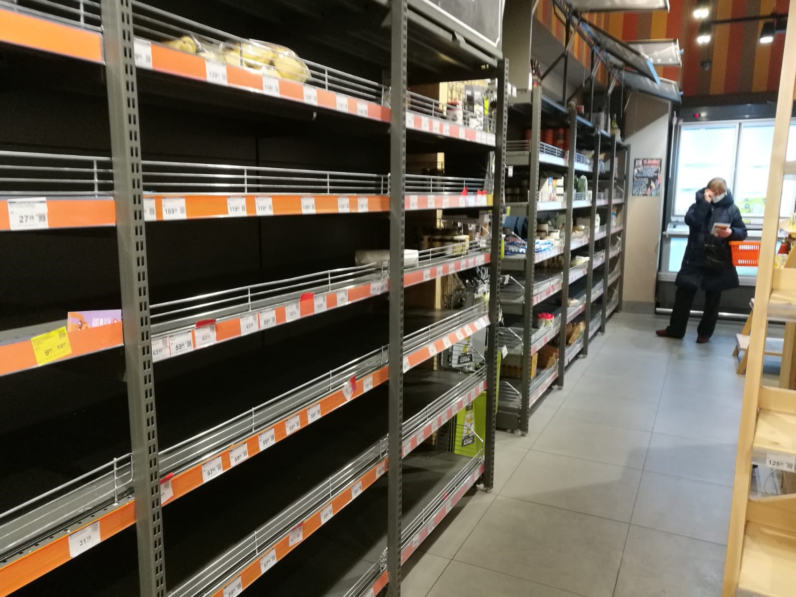 Empty shelves in a Kyiv supermarket
