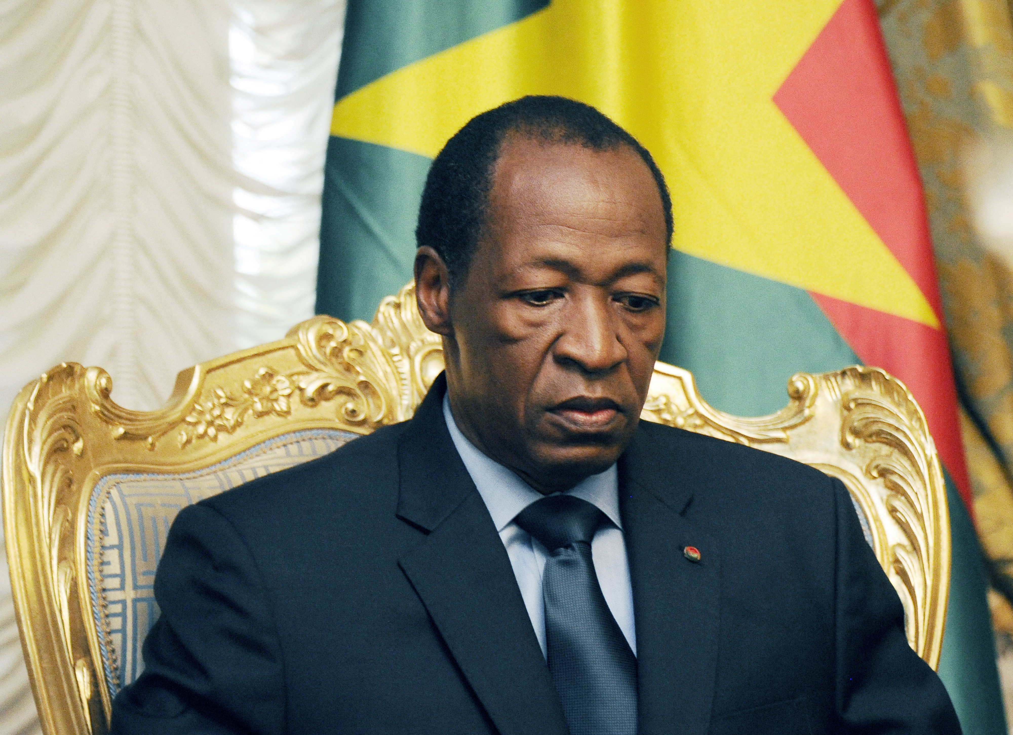 on July 26, 2014 Burkina Faso's President Blaise Compaore waits prior to meeting relatives and acquaintances of the victims of the Air Algerie crash at the Presidential Palace in Ouagadougou
