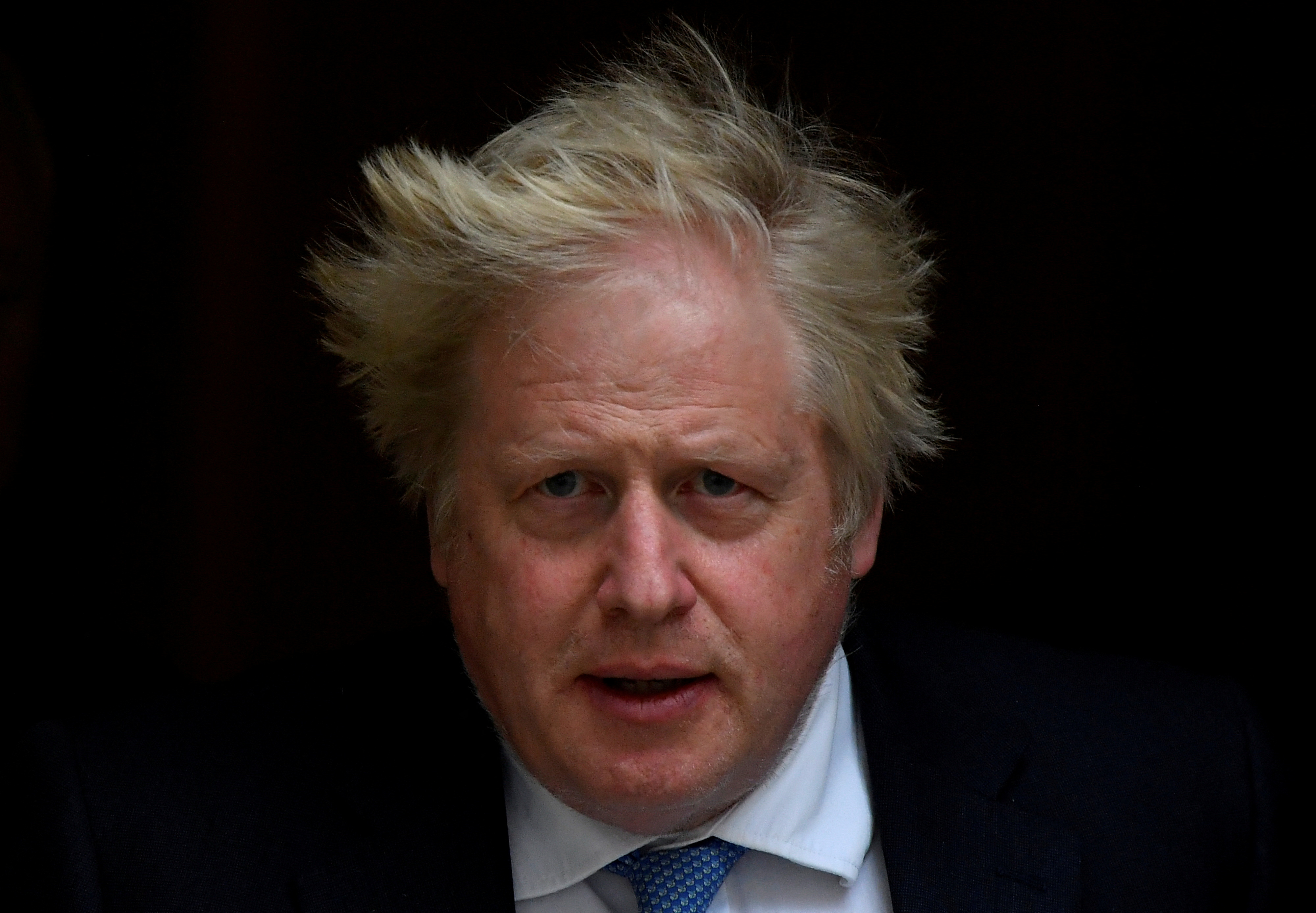 British Prime Minister Boris Johnson departs Downing Street to deliver a statement at the Houses of Parliament