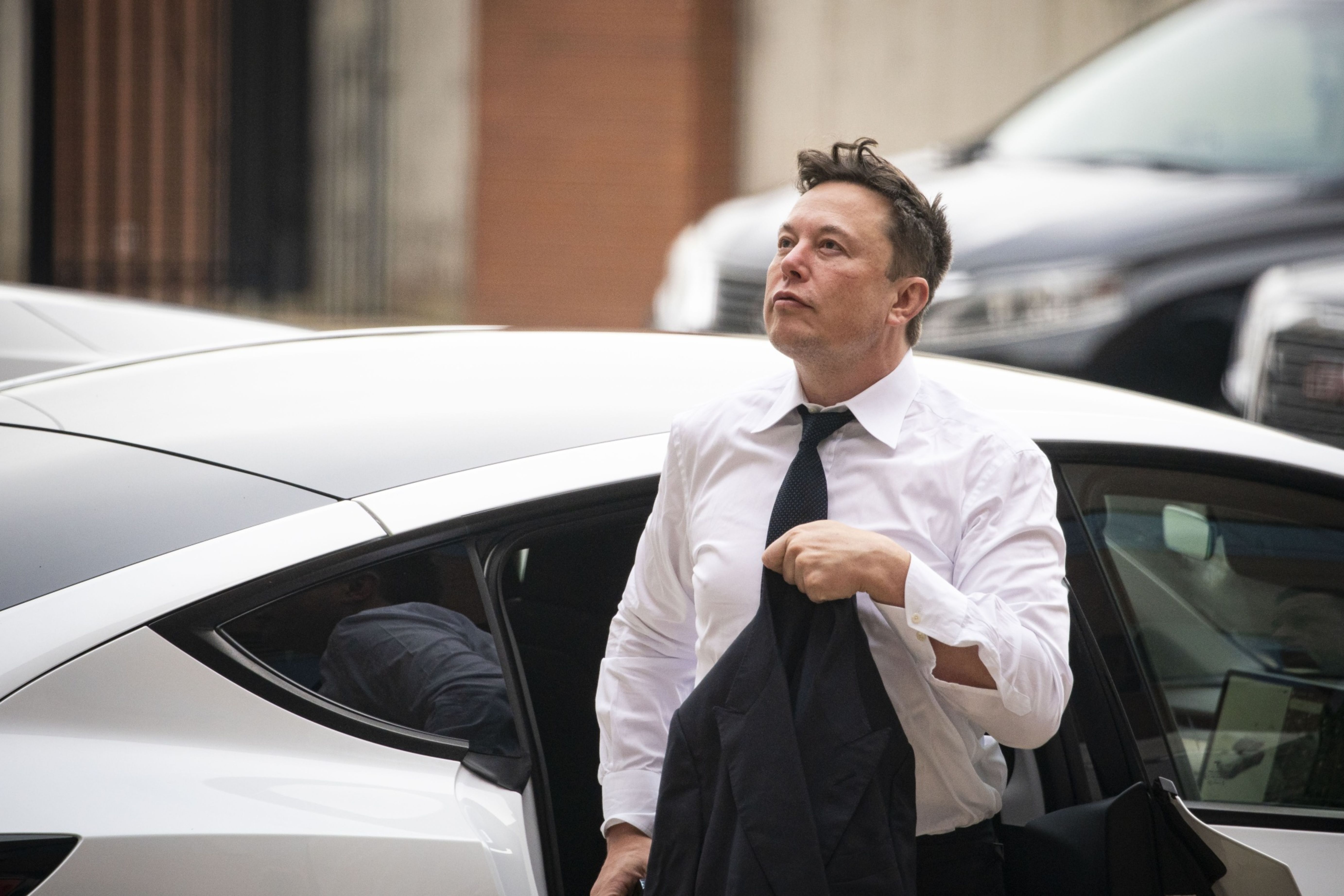 Elon Musk arrives at court in Wilmington, Delaware, in 2021 in a another successful suit brought by shareholders that challenged Tesla’s acquisition of SolarCity