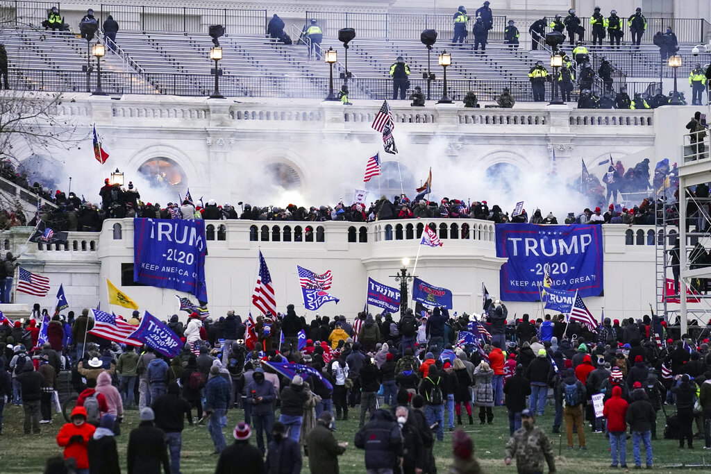 Violent insurrectionists, loyal to President Donald Trump, storm the Capitol in Washington on January 6, 2021.