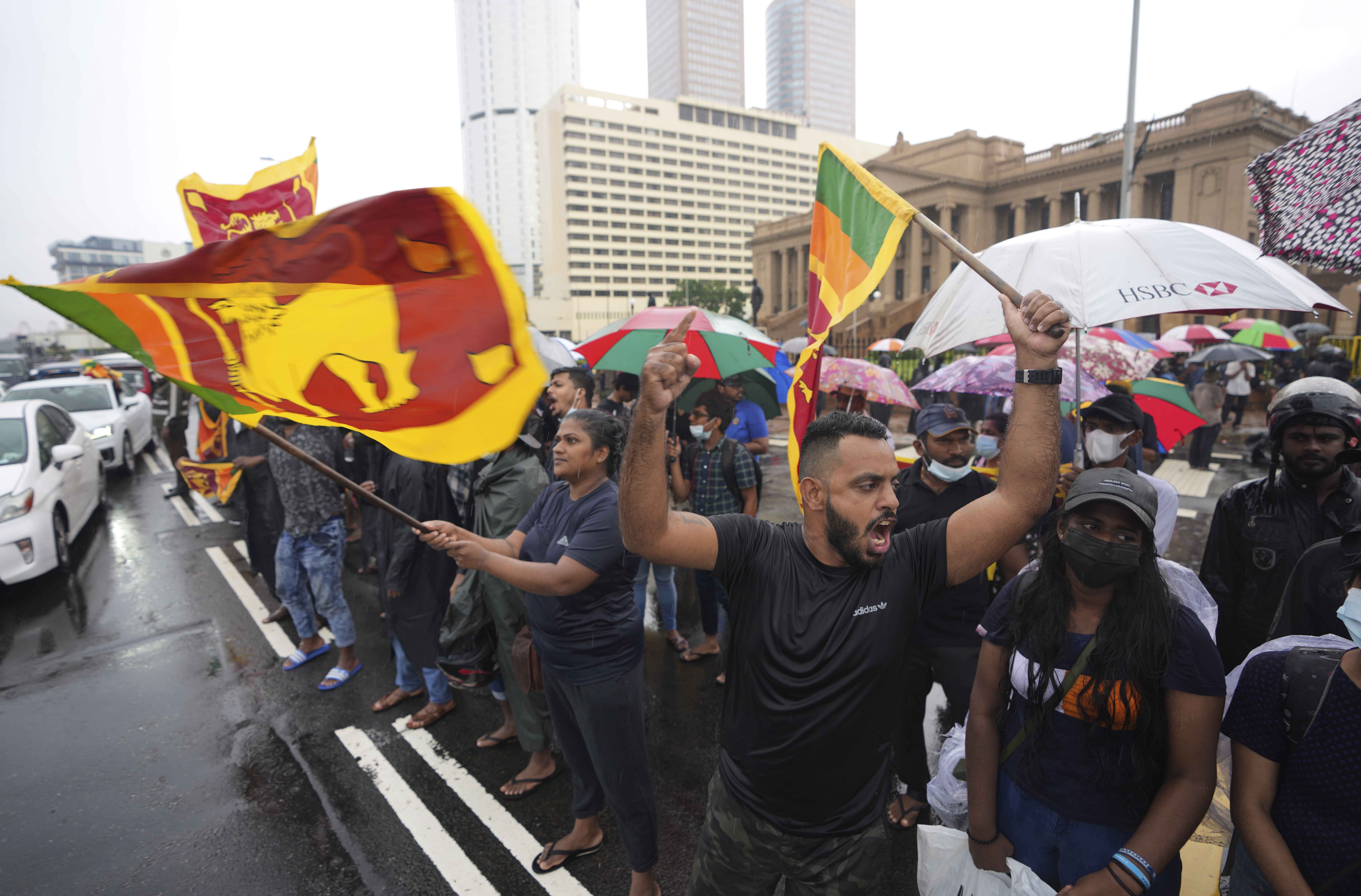 Sri Lankans demanding president Gotabaya Rajapaksa resign over the debt-ridden country’s worst economic crisis protest outside the president's office in Colombo