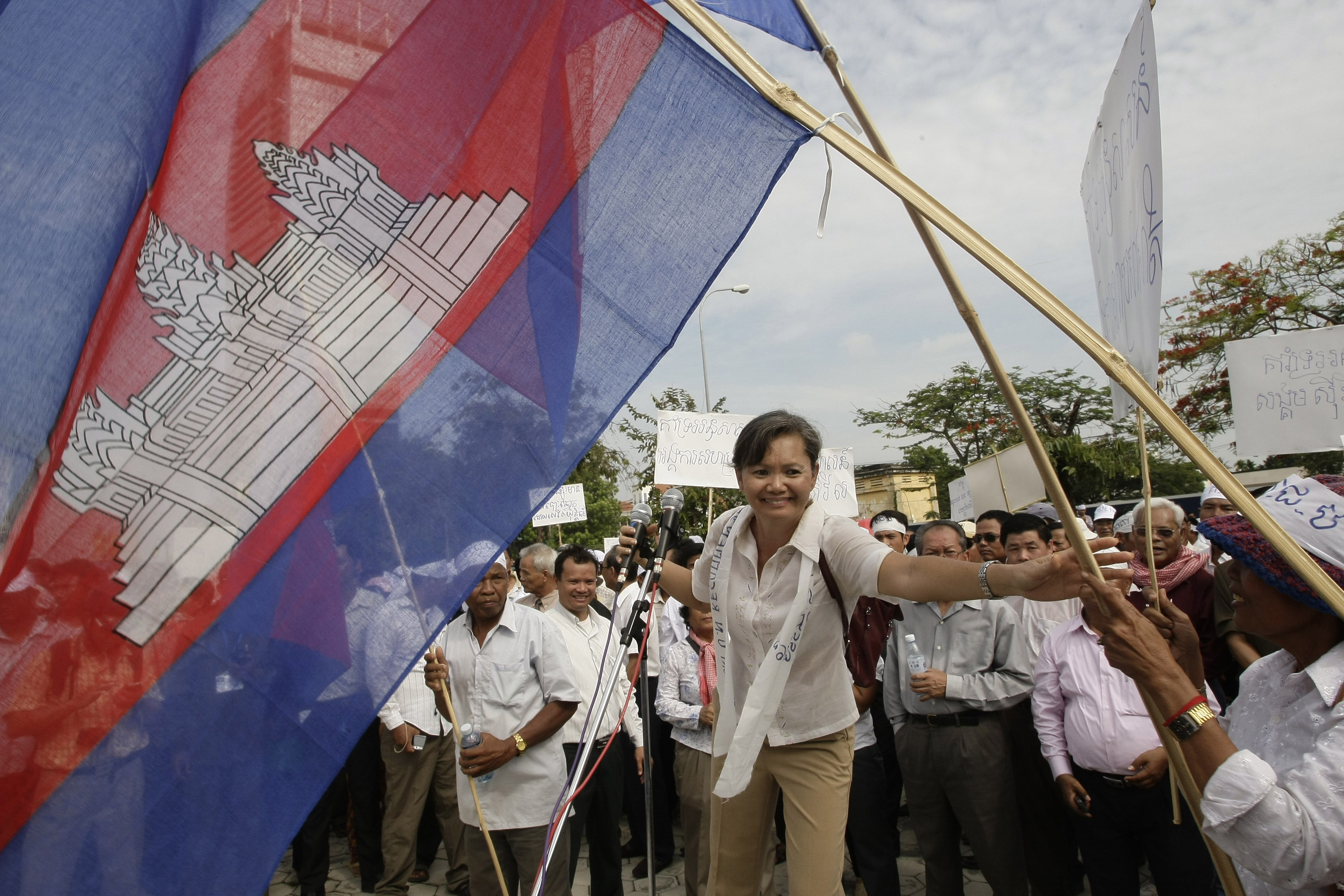 Other regimes in Southeast Asia have also targeted citizenship rights, with Cambodia cancelling the passports of several opposition politicians, including Mu Sochua, seen here at a rally after the 2013 elections