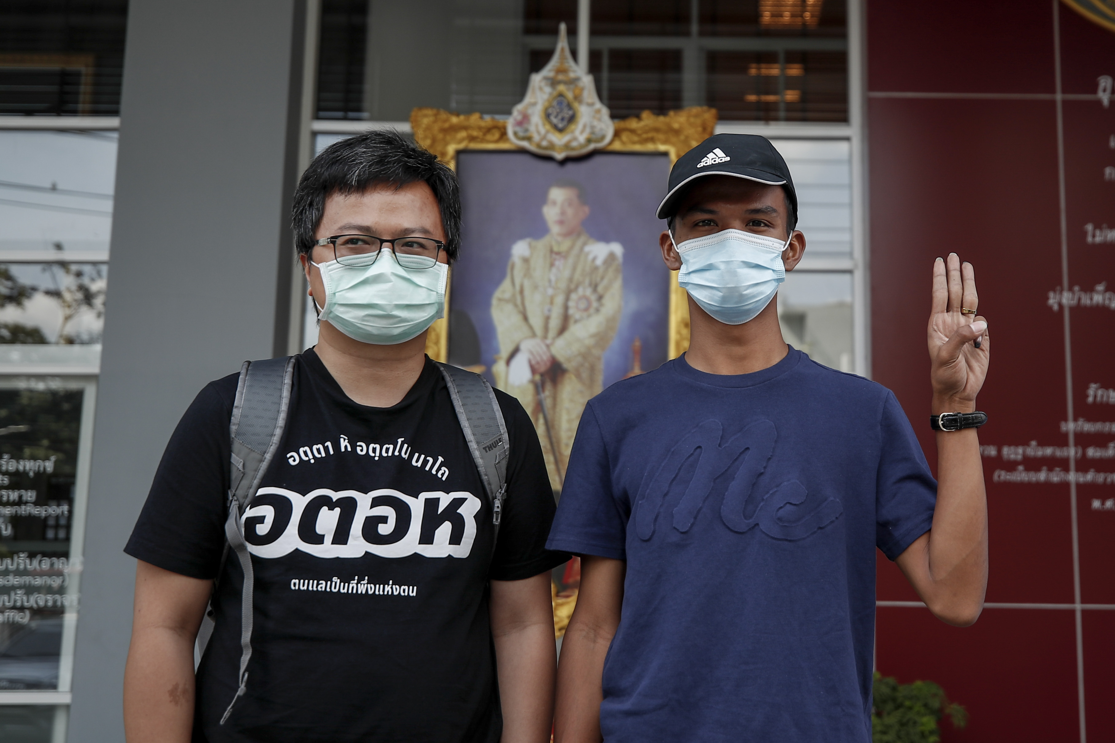 Pro-democracy protest leaders Anon Nampa (left) and Panupong ‘Mike’ Jadnok both spent time in jail when they were denied bail over charges of royal defamation and sedition