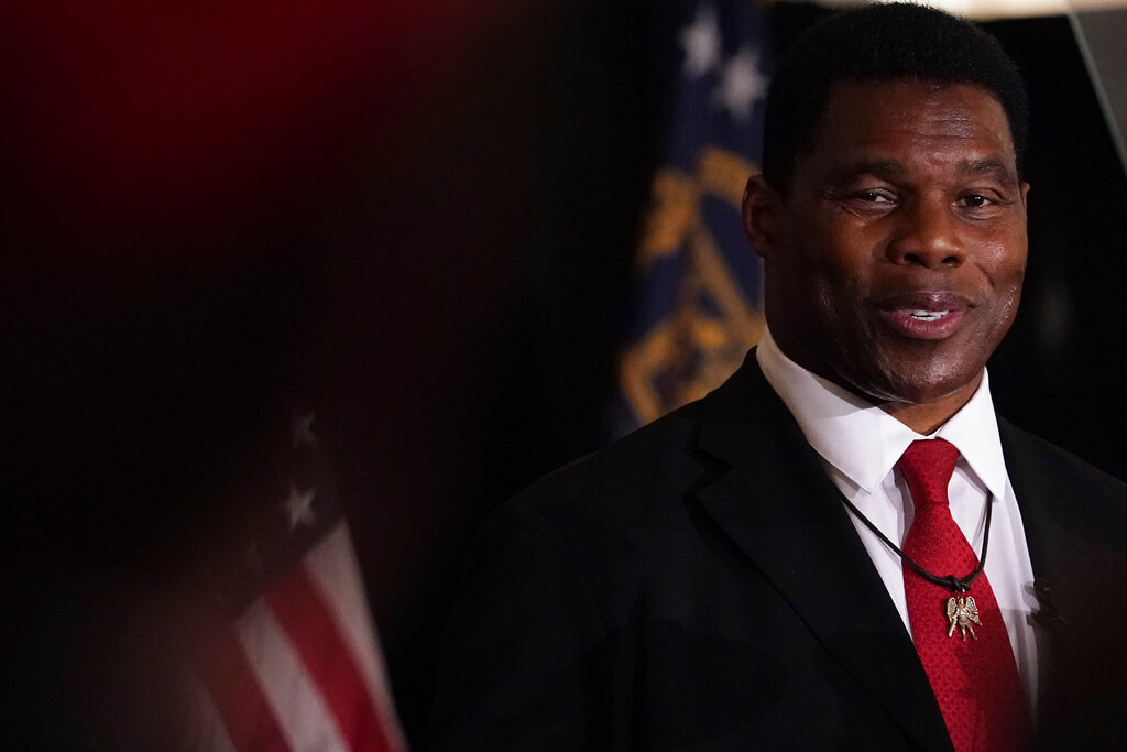 US Senate candidate Herschel Walker speaks to supporters during an election night watch party after winning the Republican nomination in Georgia’s primary