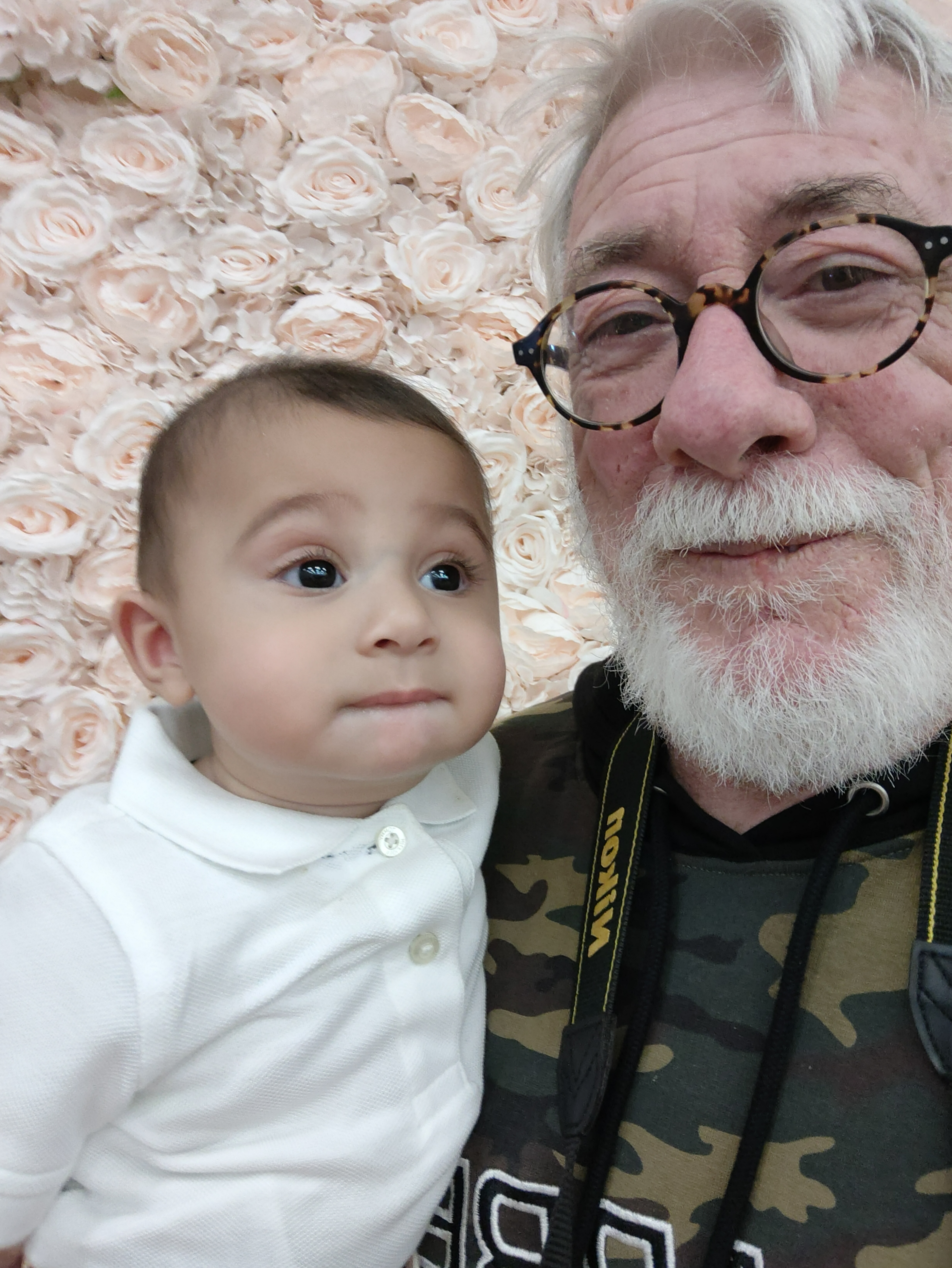 David Jobling hold an infant.