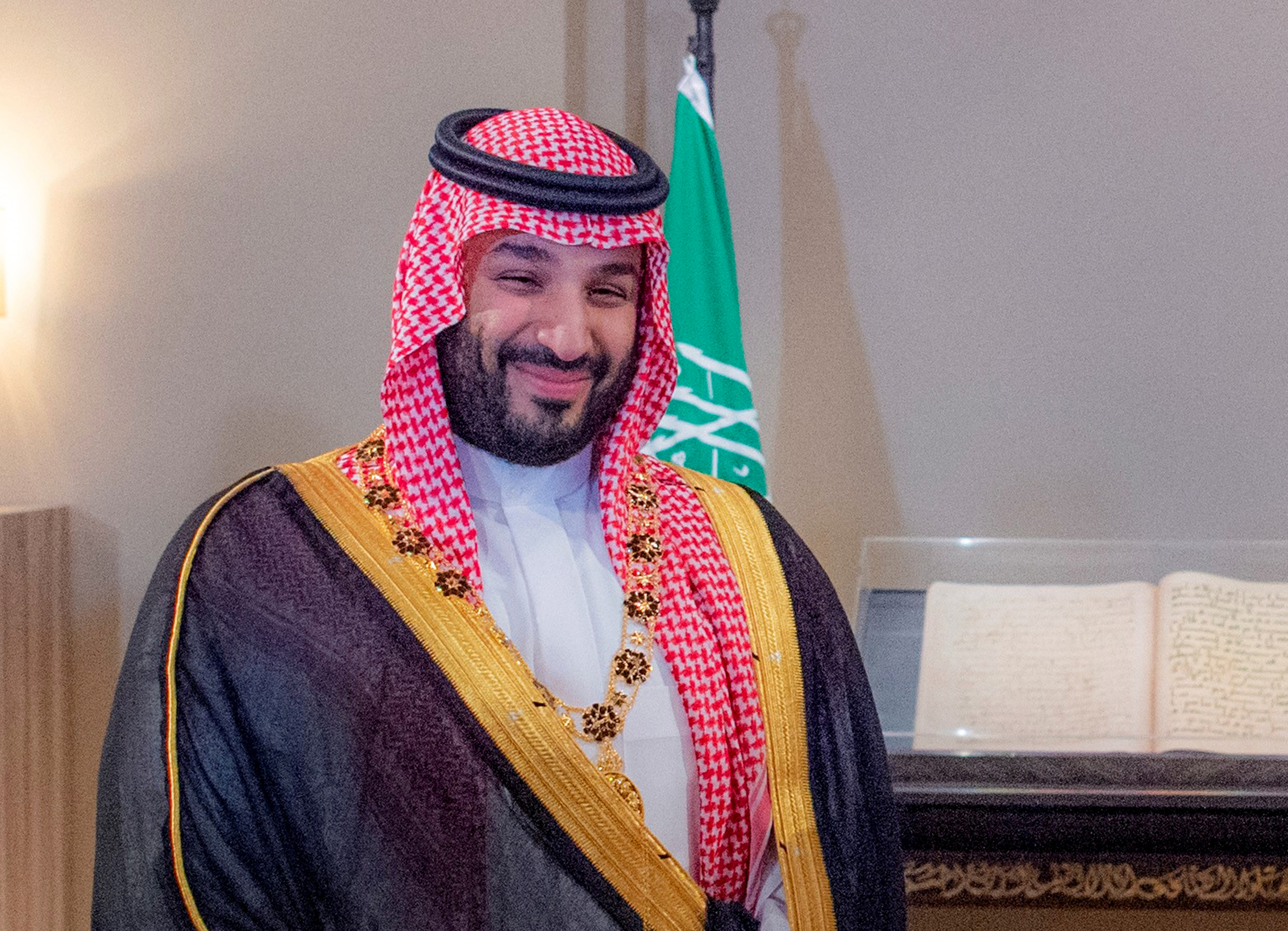 A handout picture released by the Jordanian Royal Palace shows Saudi Crown Prince Mohammed bin Salman smiling