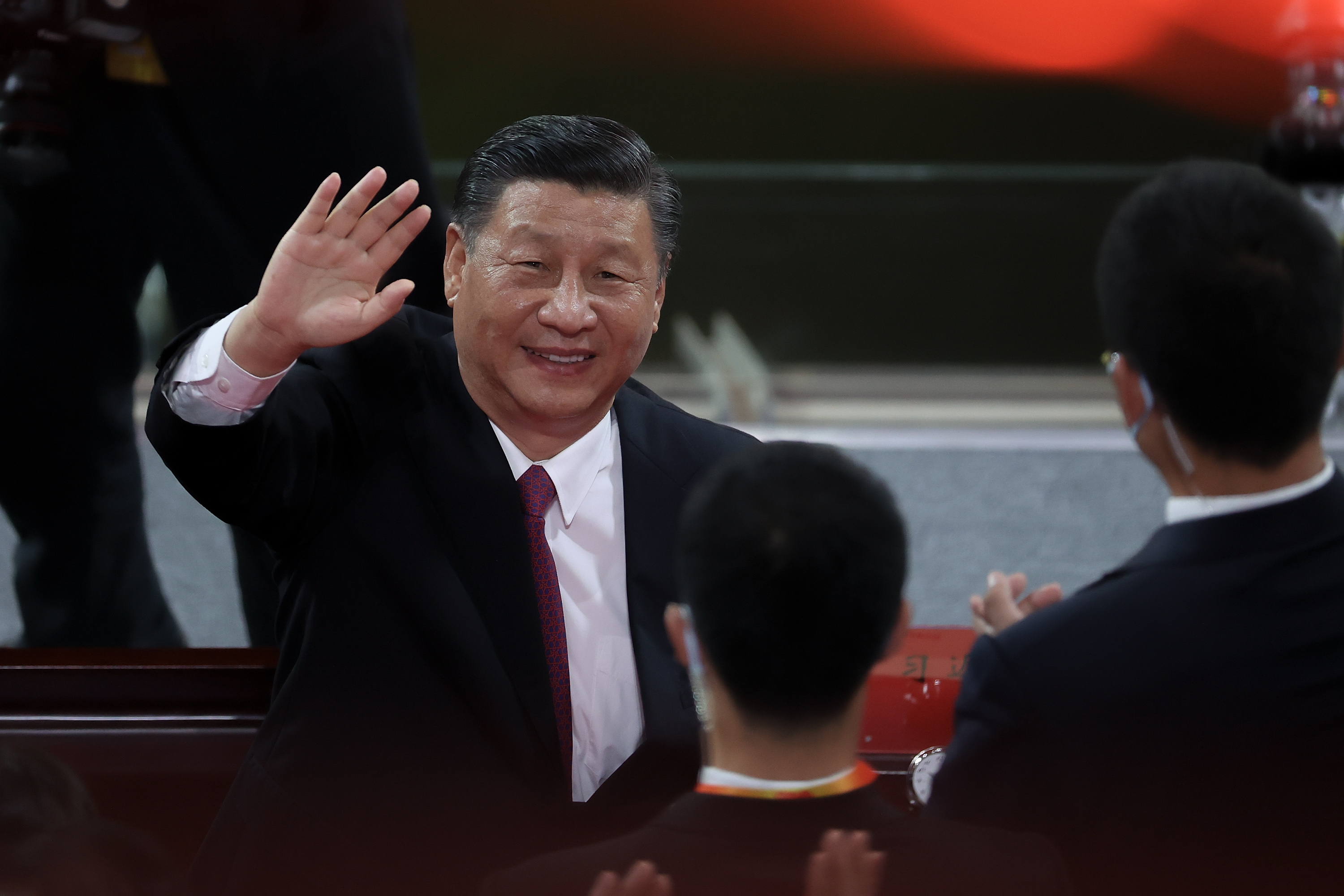 Chinese President Xi Jinping waves