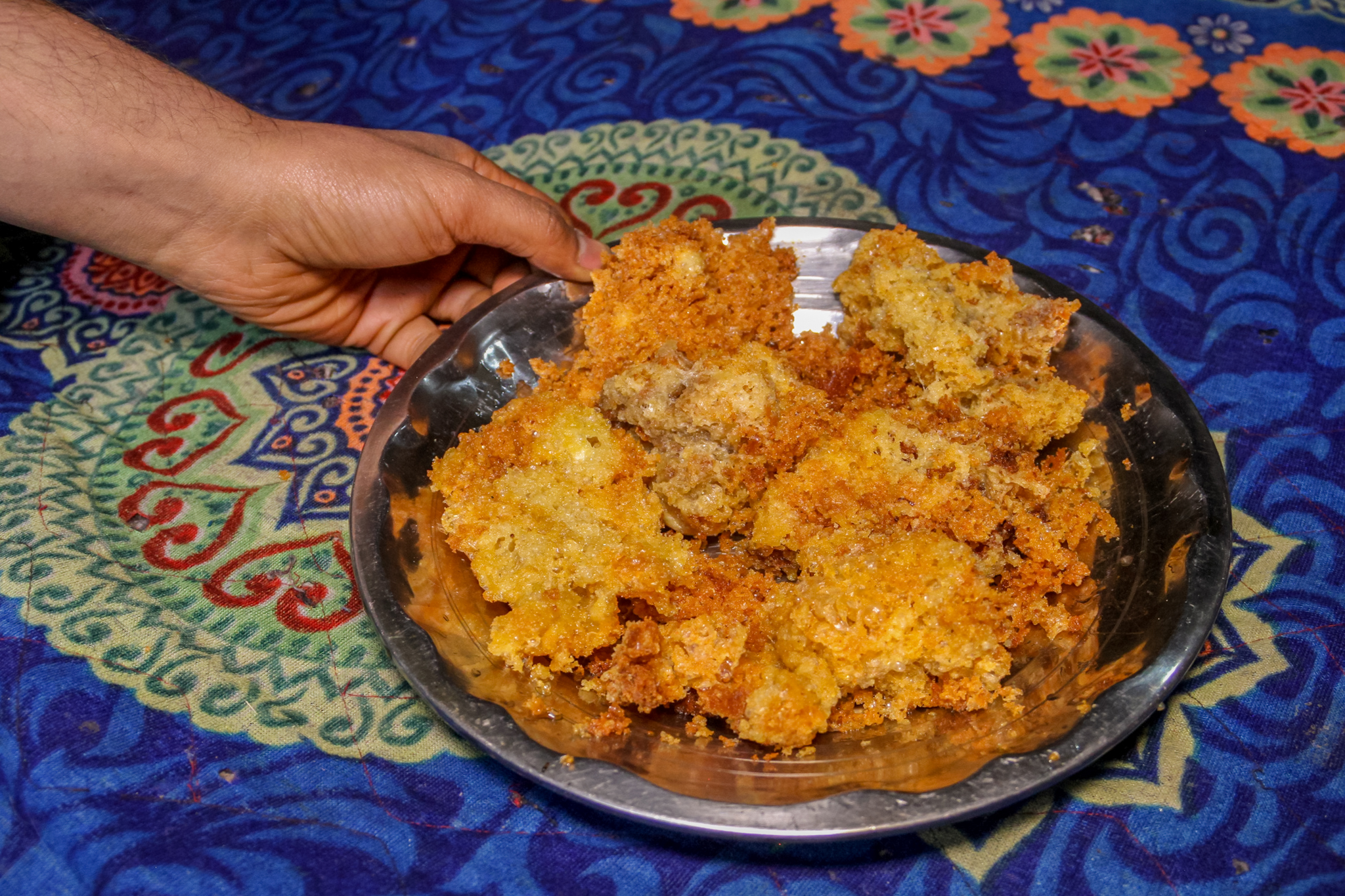 When kalari is fried in mustard oil, it gets crisp and golden on the outside and stays soft and creamy on the inside