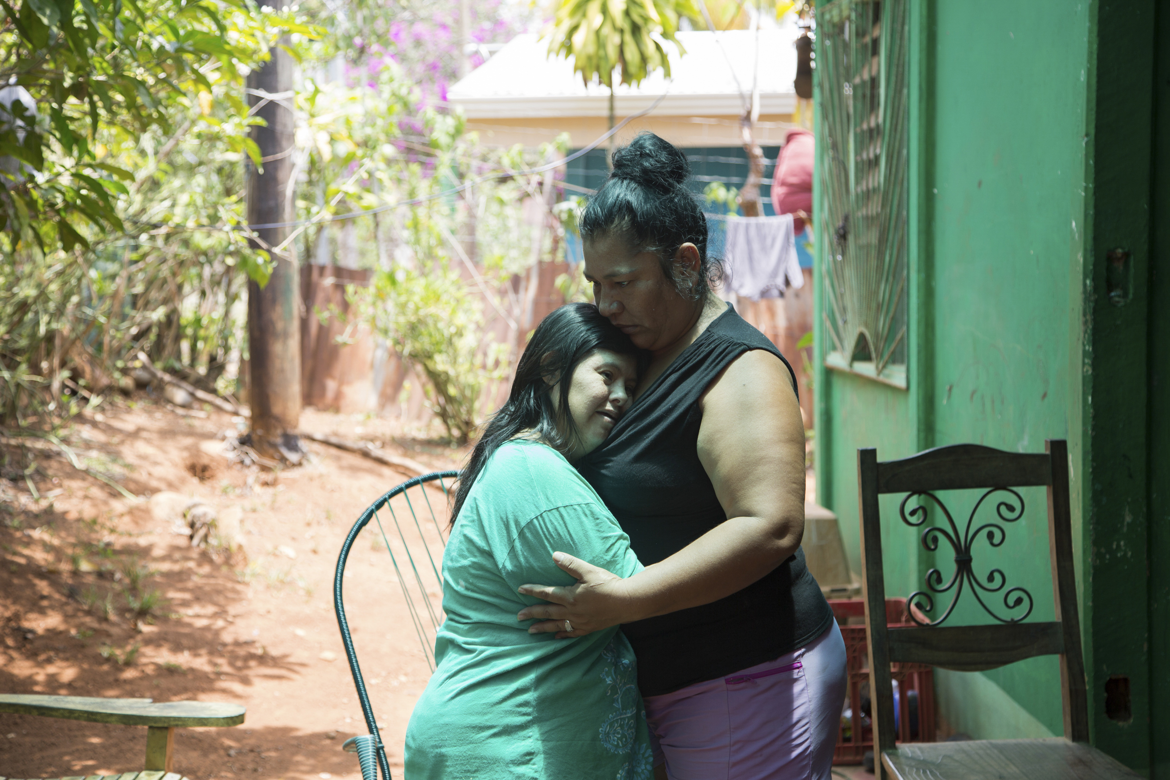 A photo of Mareju Vargas, 46, at her home in Terraba hugging her 42-year-old sister Ana Laura.