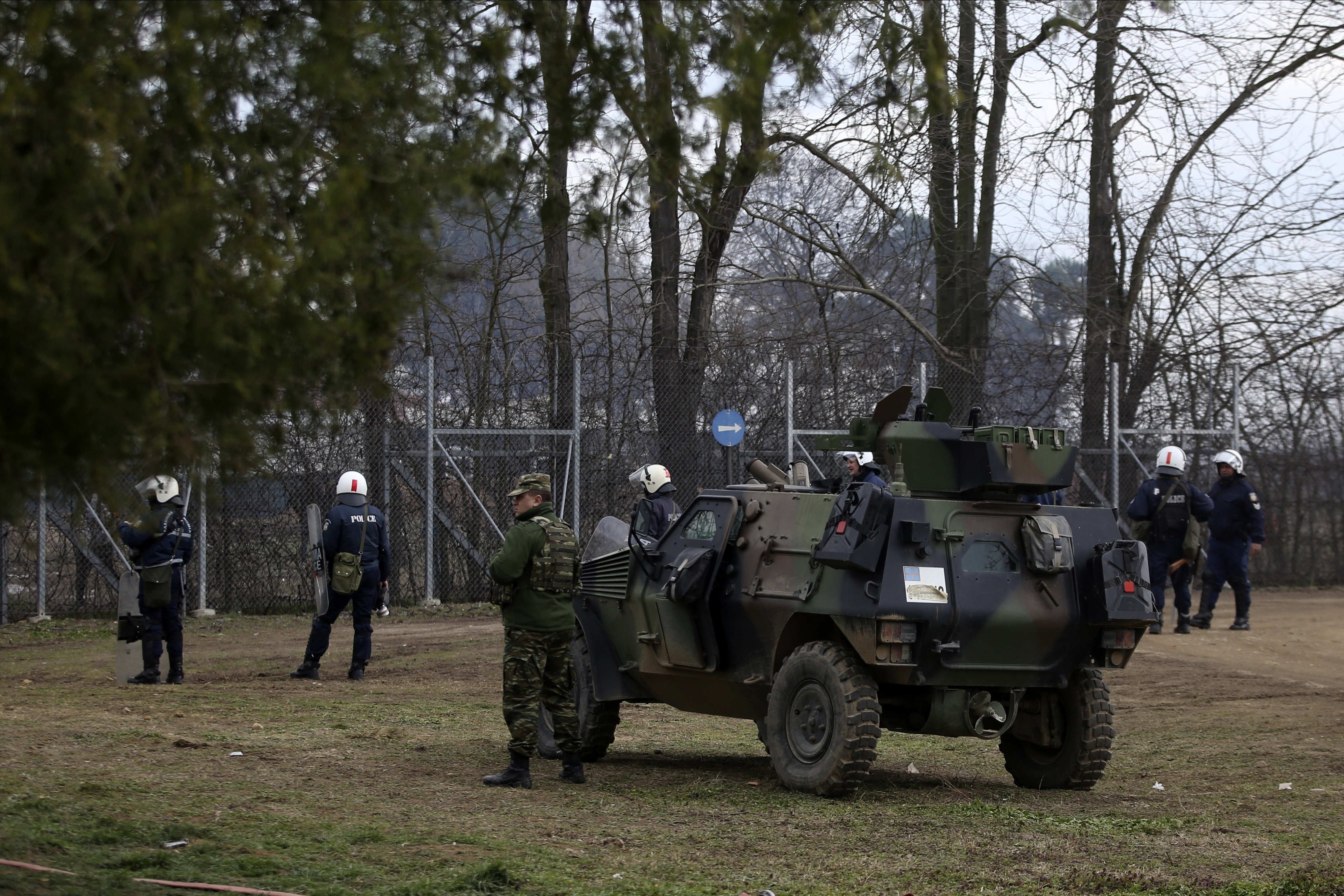 Greek Army and Police guard the border gate in Kastanies village as migrants try to enter Greece from the Pazarkule border gate, Edirne, Turkey, at the Greek-Turkish border Saturda