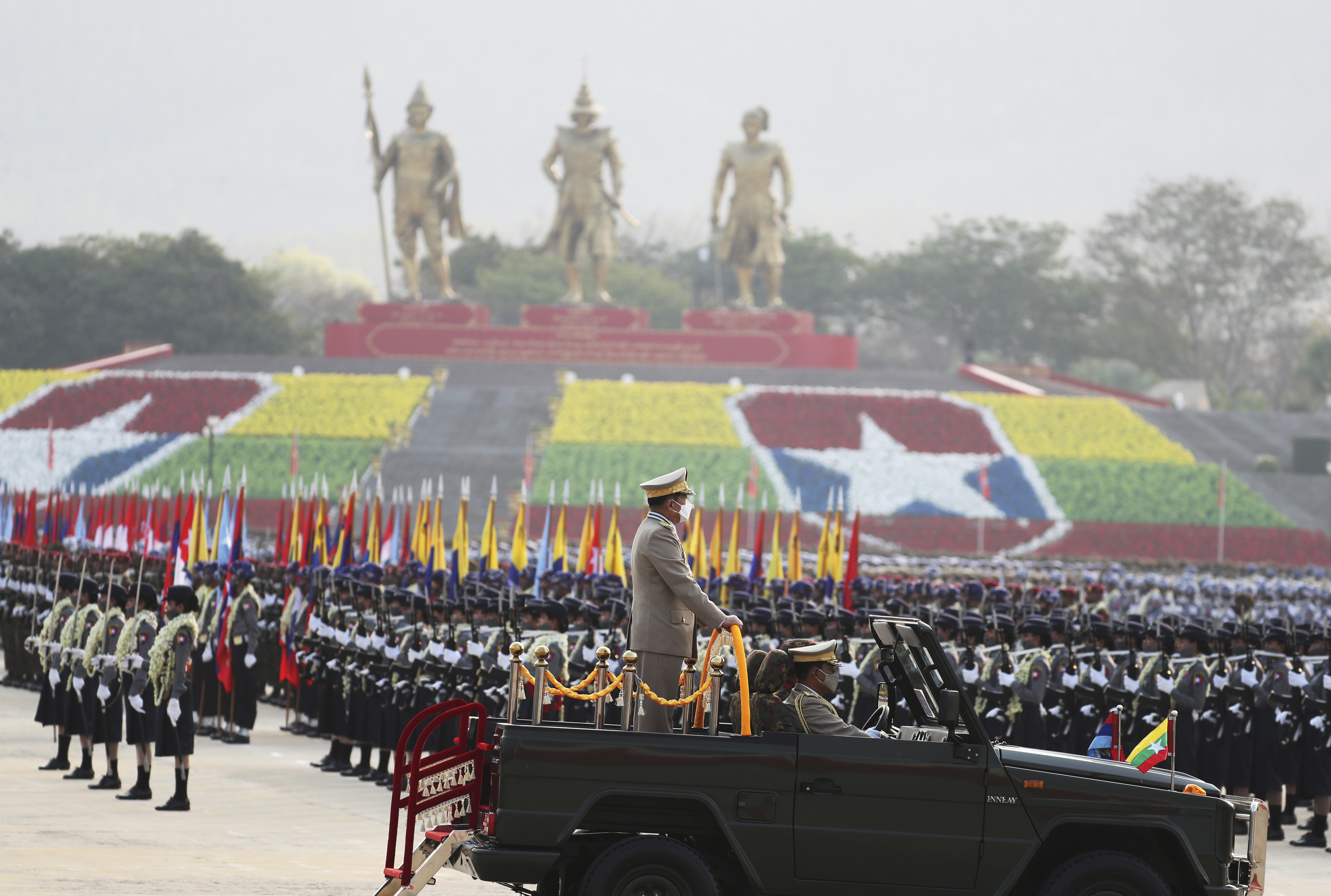 Senior General Min Aung Hlaing surveys his troops at the massive parade ground in Nay Pyi Taw on Armed Forces Day in 2022.