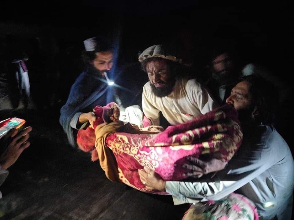 In this photo released by a state-run news agency Bakhtar, Afghans evacuate wounded in an earthquake in the province of Paktika, eastern Afghanistan, Wednesday, June 22, 2022. (Bakhtar News Agency via AP)