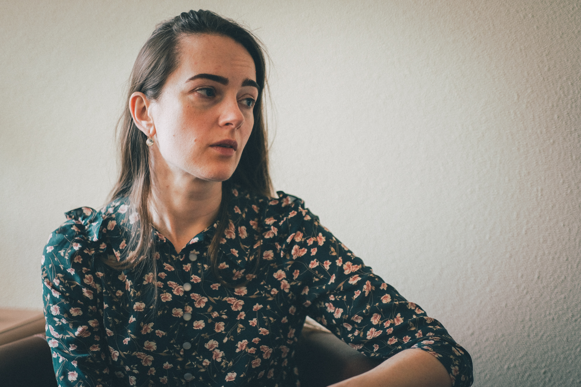 A photo of Oleksandra Matviichuk looking to the side.