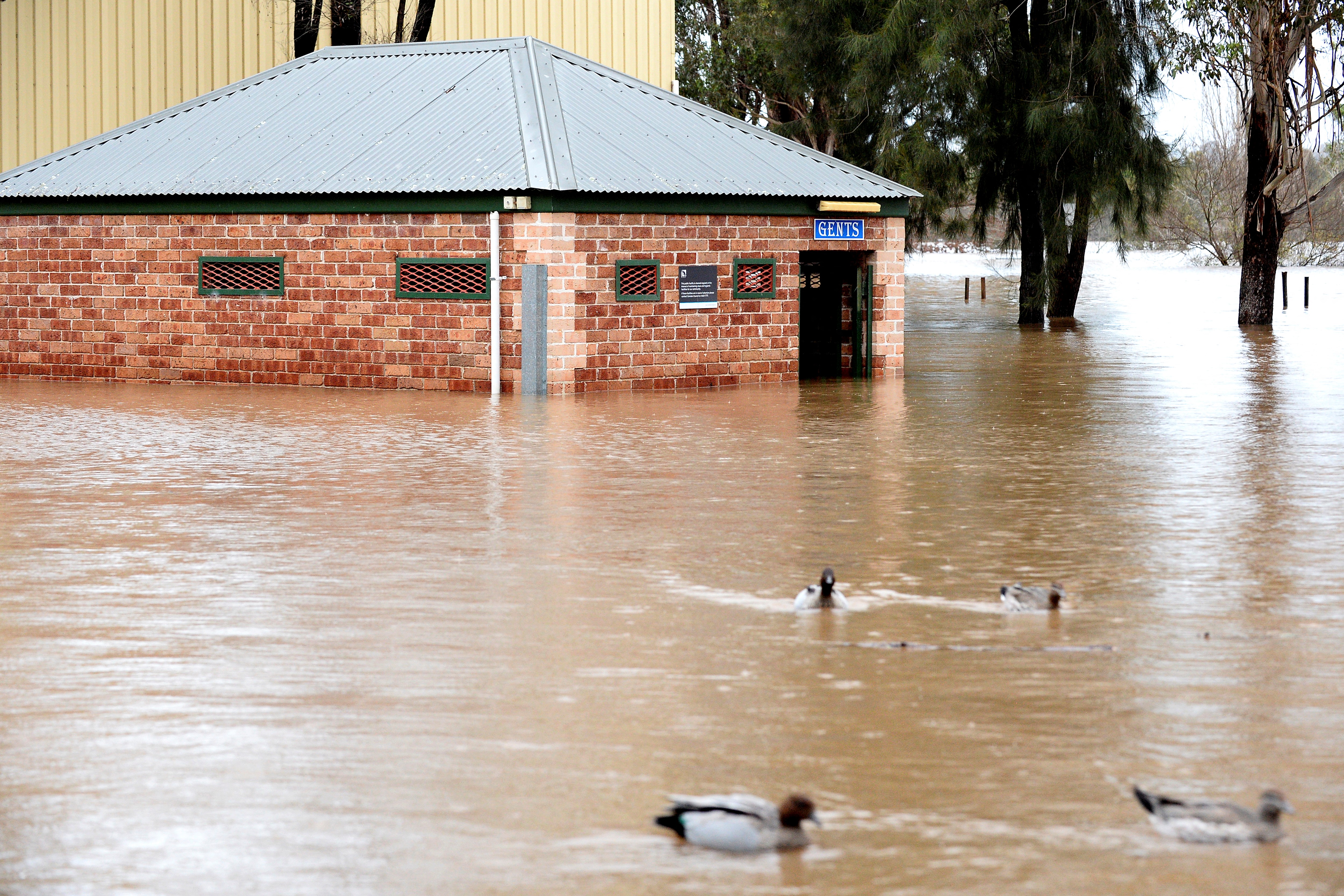 A general view shows a flooded area due to torrential rain in the Camden suburb