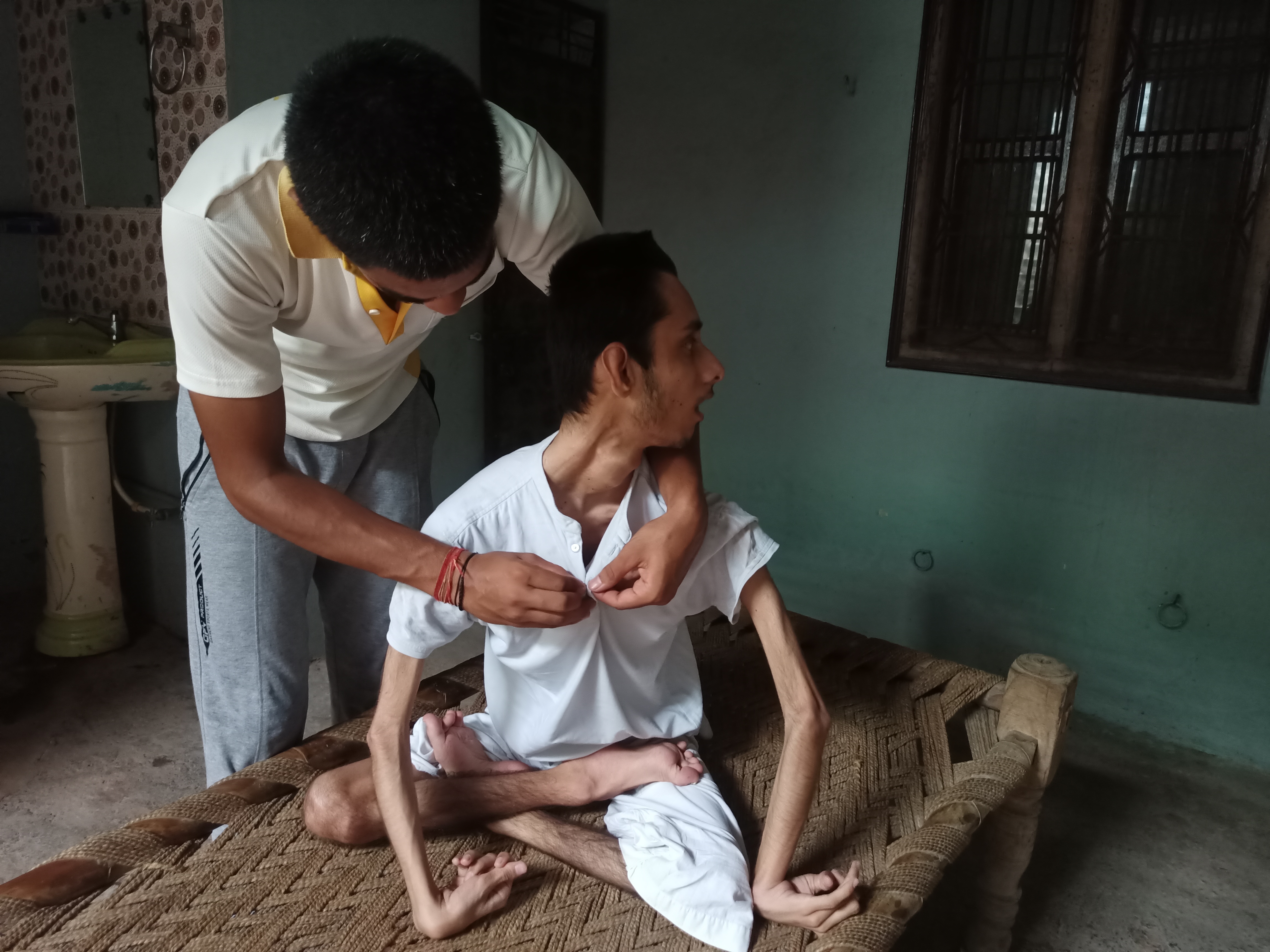 Vikas in his house in Gangnauli, Uttar Pradesh, India.
