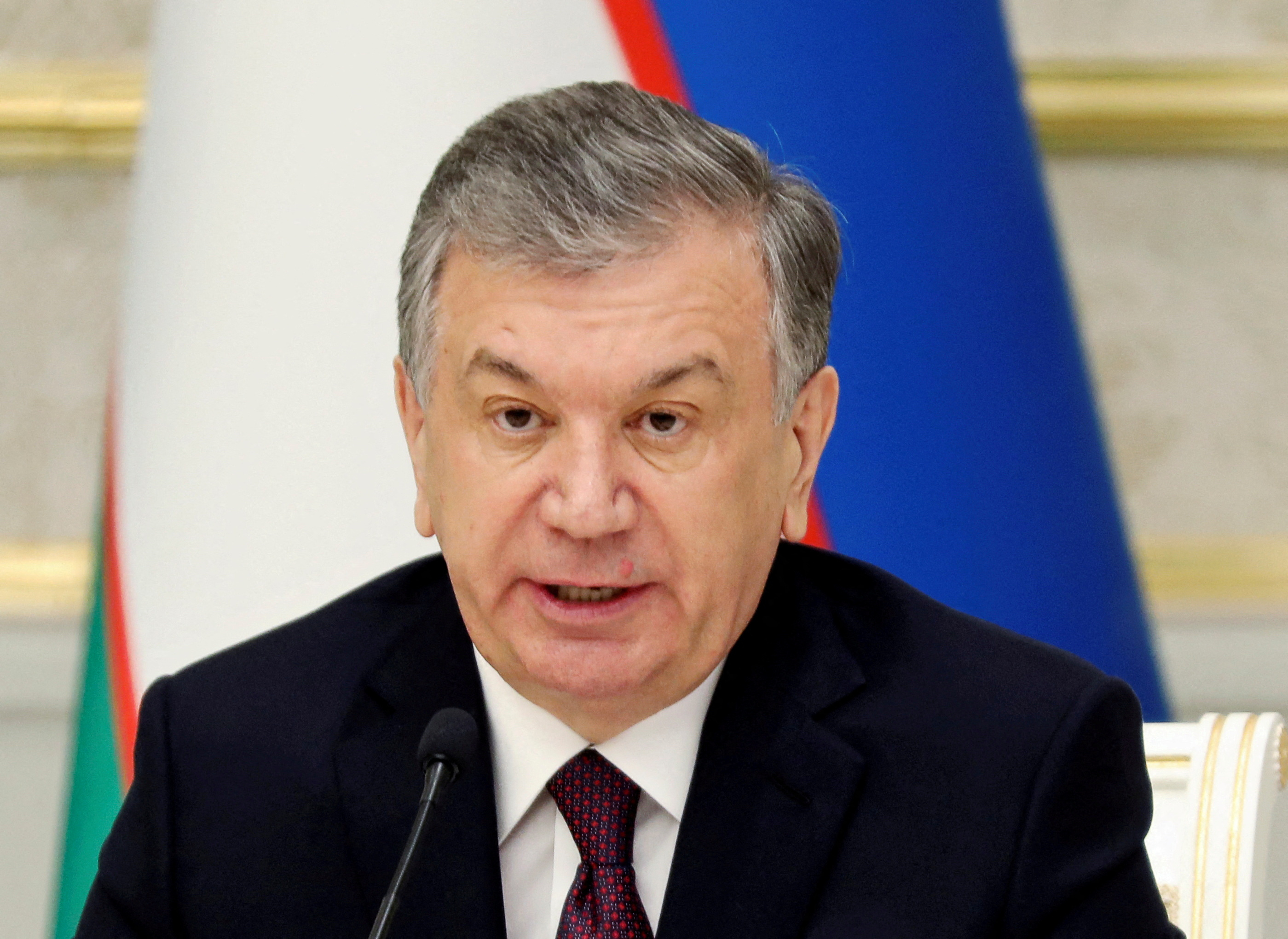 Uzbek president Shavkat Mirziyoyev attends a news conference