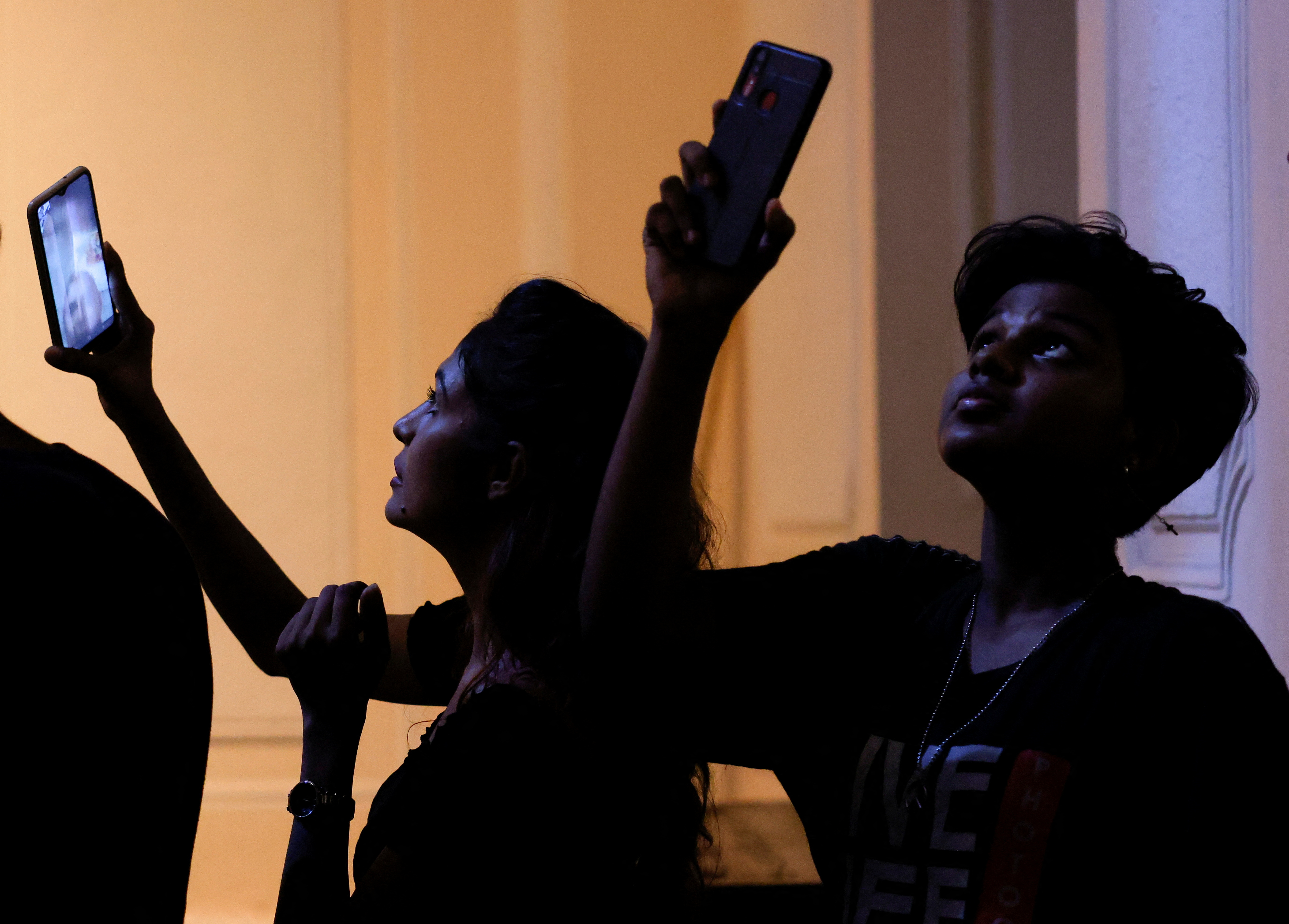 People take pictures inside the President's house