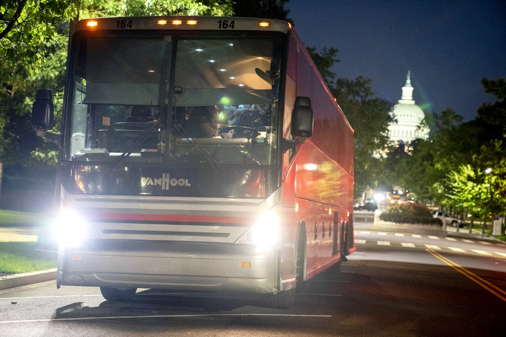 A bus from Del Rio, Texas, carrying migrants from Venezuela, near the US Capitol in Washington, DC