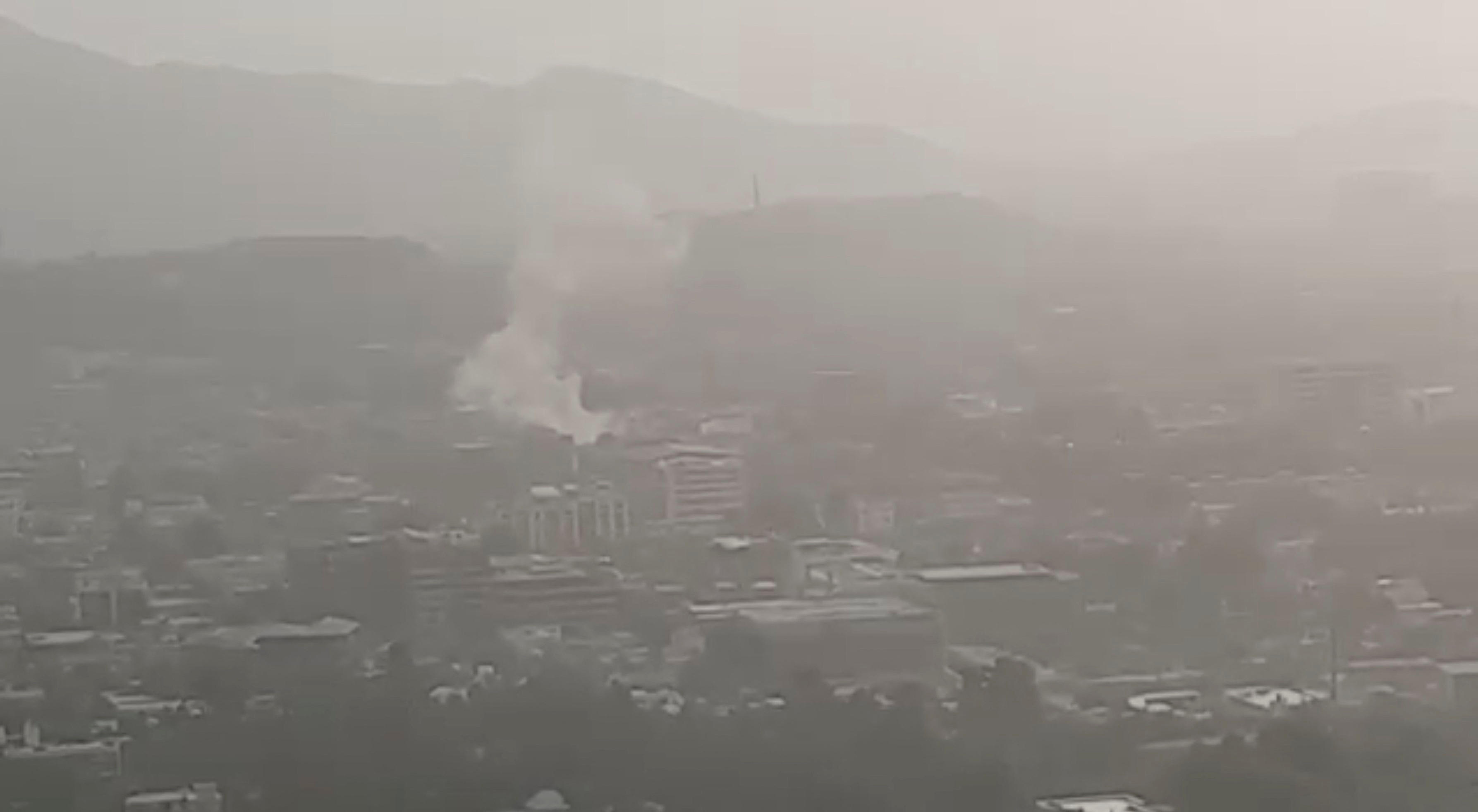 A general view shows smoke rising from a house in Kabul, Afghanistan July 31